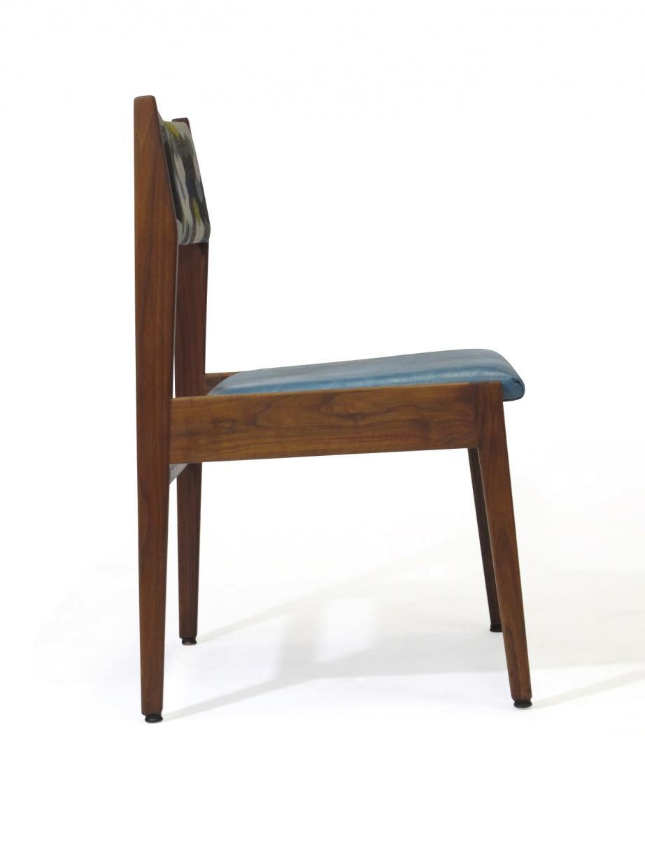 Midcentury walnut side chair designed by Jens Risom. Chair crafted at solid walnut frame, newly upholstered in teal leather seat and print on backrest. Chair is fully restored in excellent condition with signs of age used.