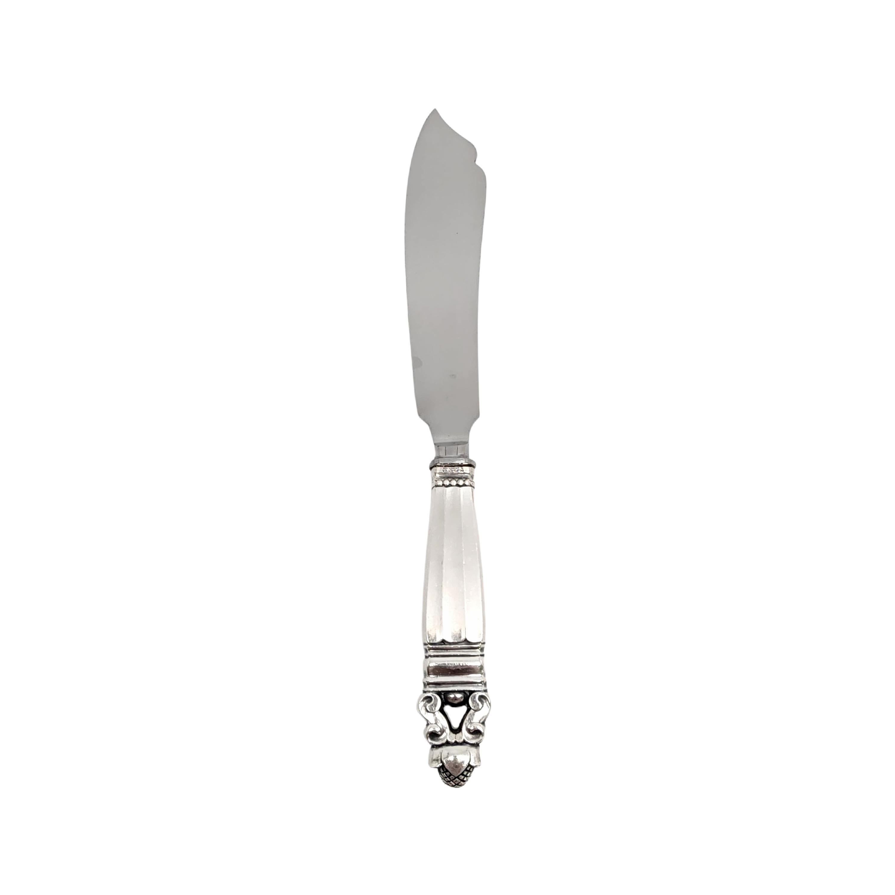 Sterling silver handle stainless blade cake knife in the Acorn pattern by Georg Jensen.

The Acorn pattern was introduced in 1915 as a collaboration between Georg Jensen and designer Johan Ronde. The Acorn pattern, which combines Art Nouveau and Art