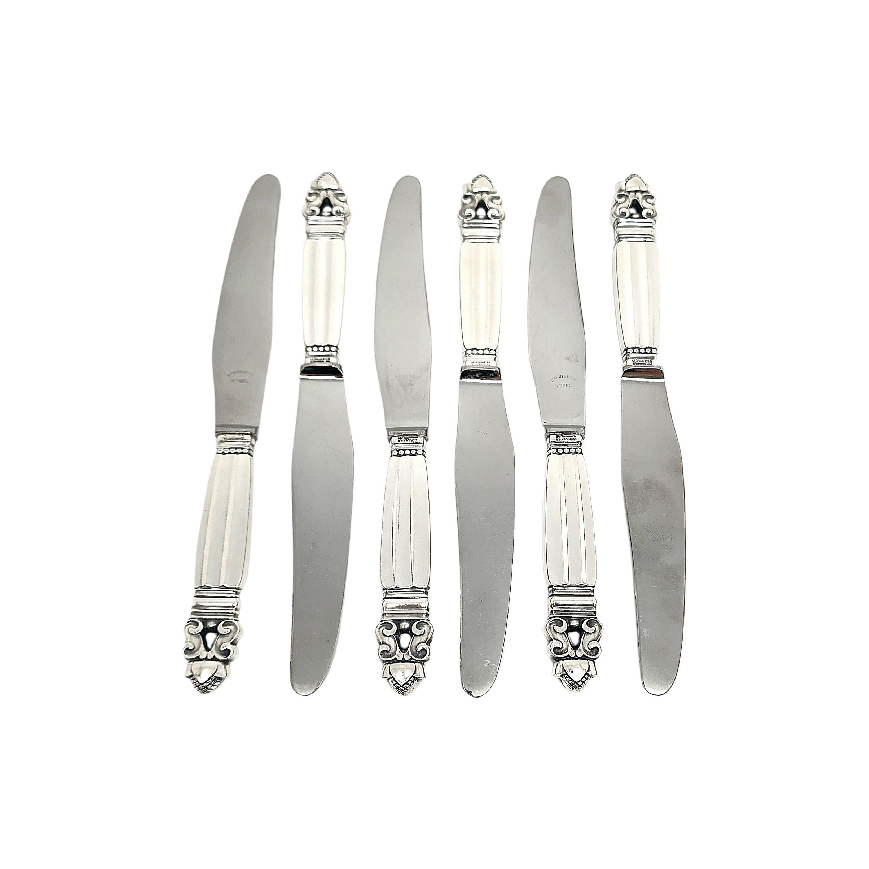 Set of 6 sterling silver handle stainless blade knives in the Acorn pattern by Georg Jensen.

The Acorn pattern was introduced in 1915 as a collaboration between Georg Jensen and designer Johan Ronde. The Acorn pattern, which combines Art Nouveau