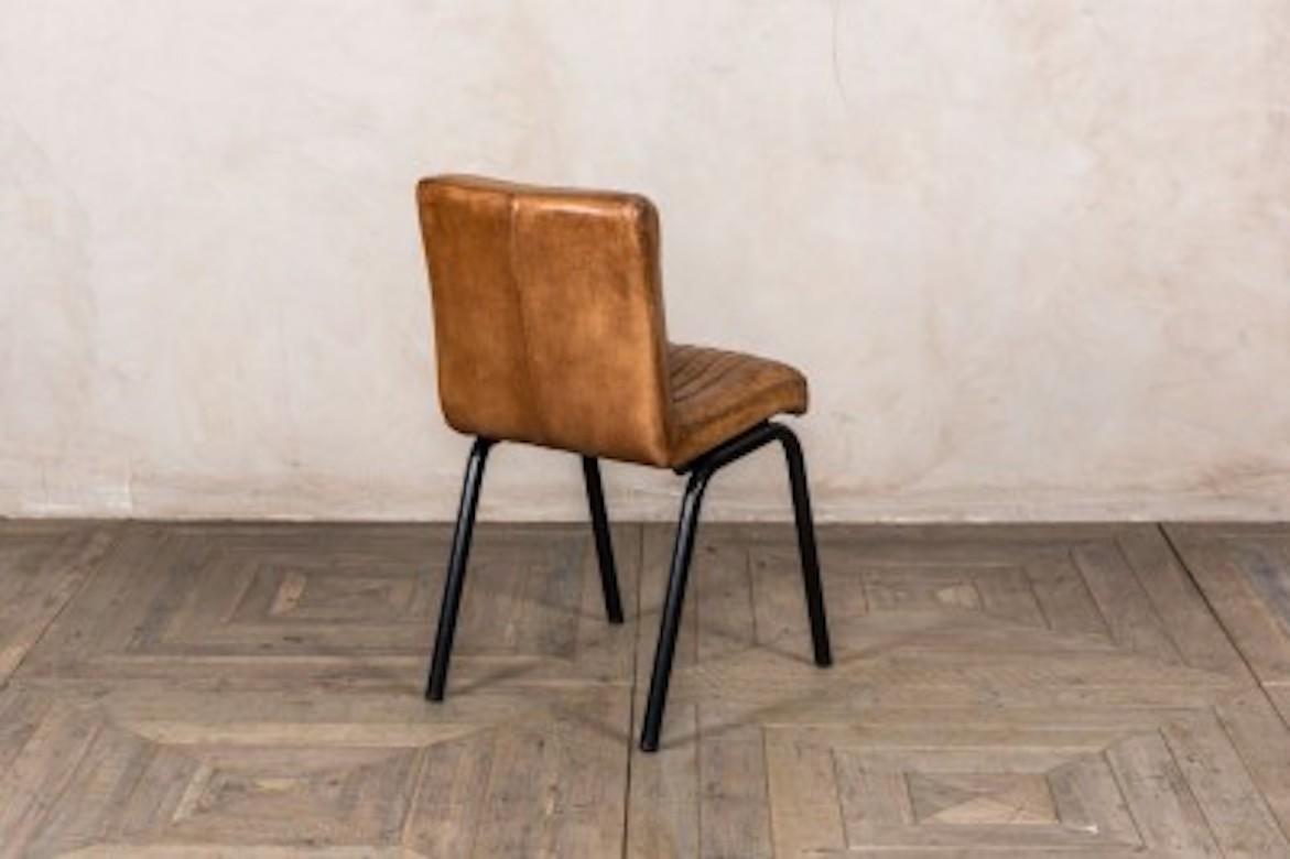 distressed tan leather dining chairs