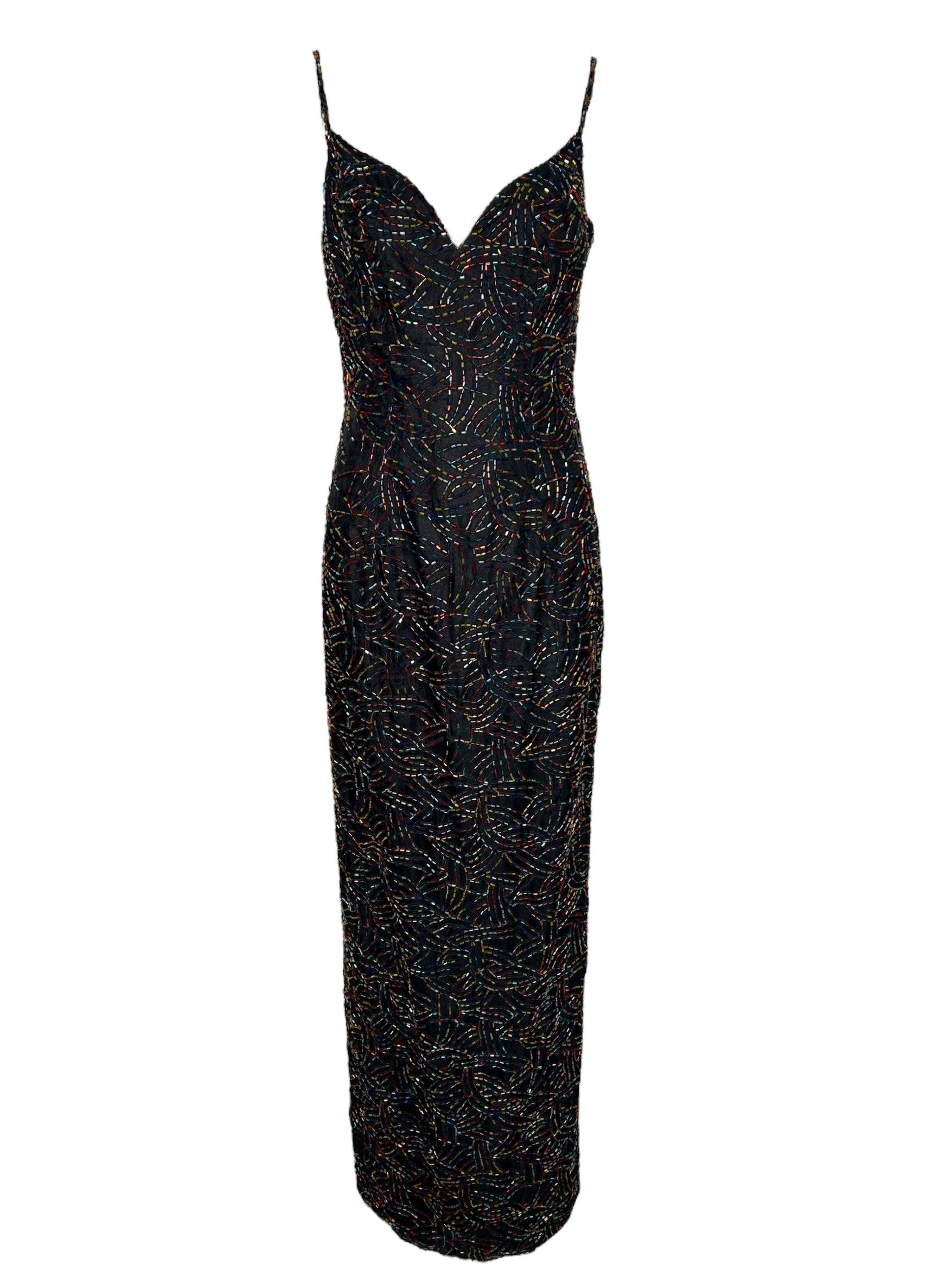 Jeran 1990s Rainbow Beaded Gown with Marching Jacket.  Showcasing rainbow beadwork, this gown is the perfect choice for any red carpet event. Spaghetti straps with open scoop back. Matching cropped long sleeved jacket.  In very good vintage