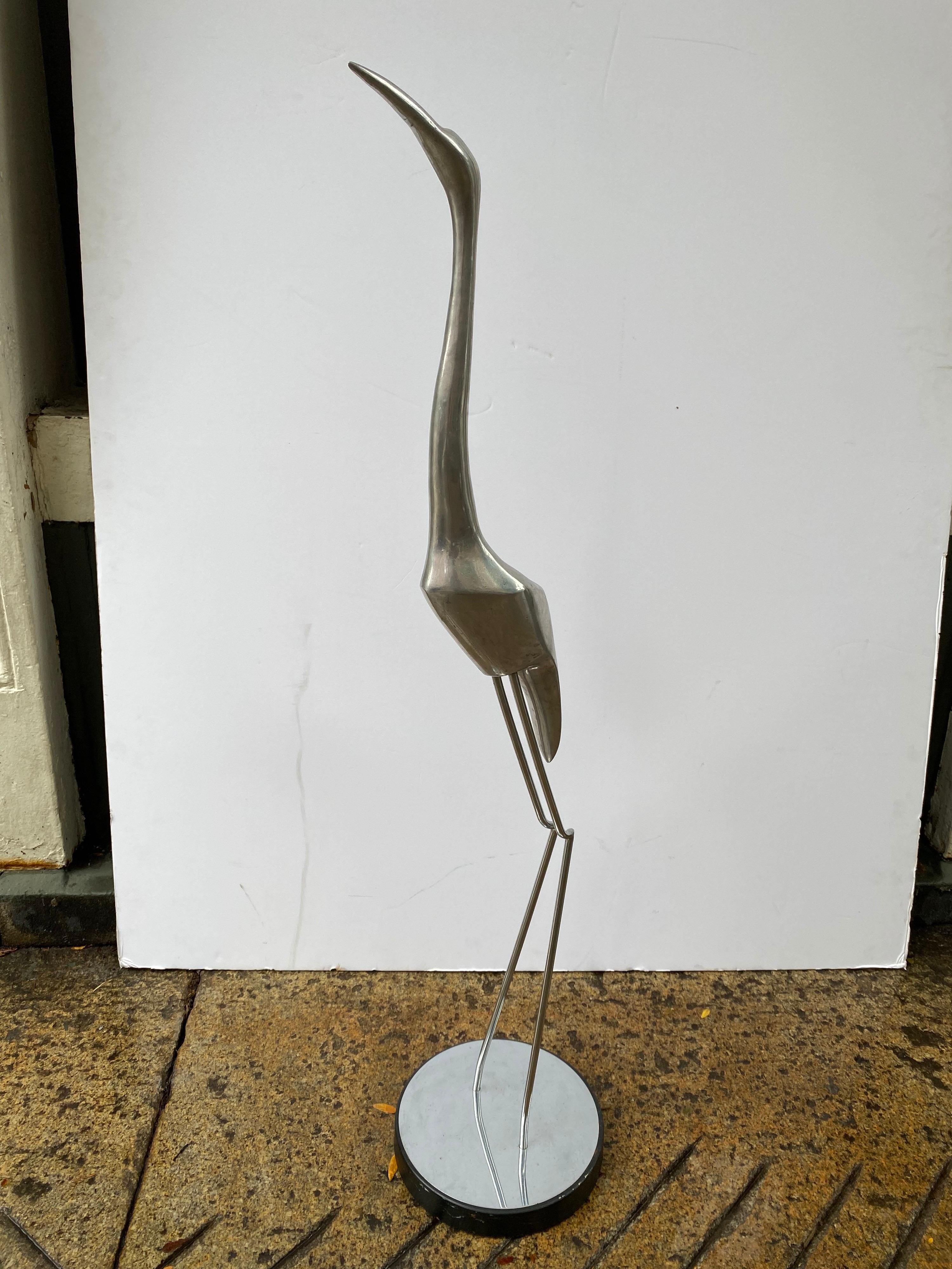 Jere' aluminum free standing heron. Body is aluminum with a chrome round base. Nice scale and size! Stands at 46
