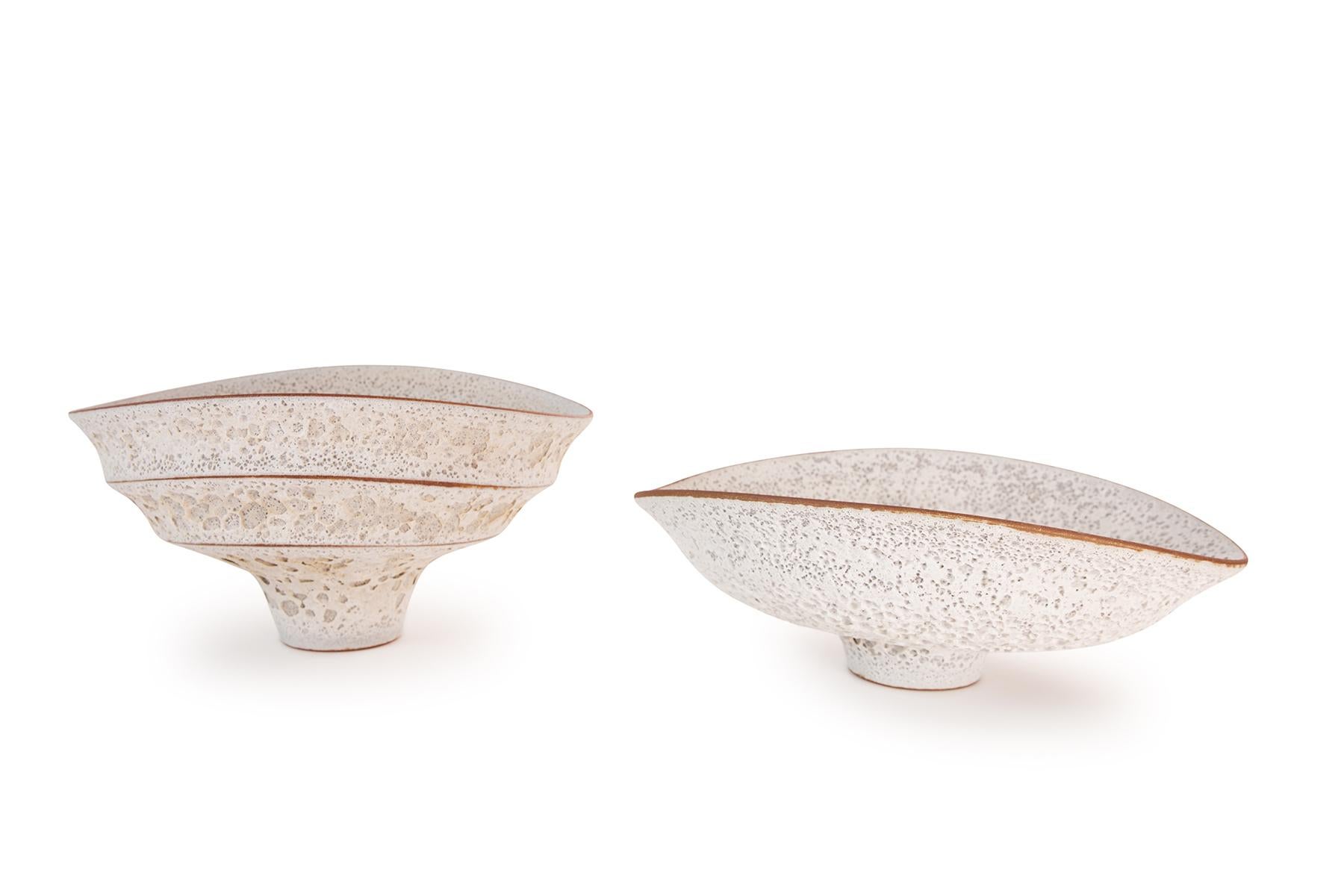 Double-tiered ceramic stemmed large bowl created in a mid-century modern style with a distinctive crackled volanic-like white textured finish by contemporary Arizona artist Jeremy Briddell.