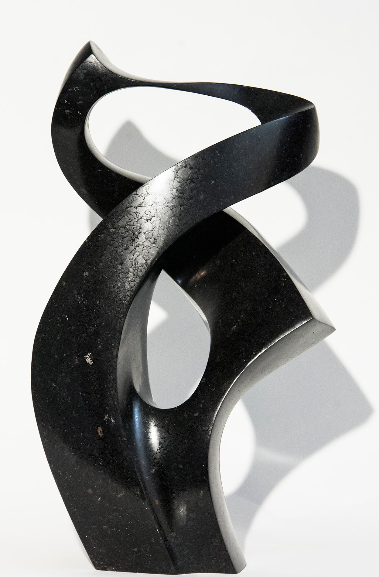 Embrace 1/50 - small, smooth, polished, abstract, black granite sculpture - Sculpture by Jeremy Guy