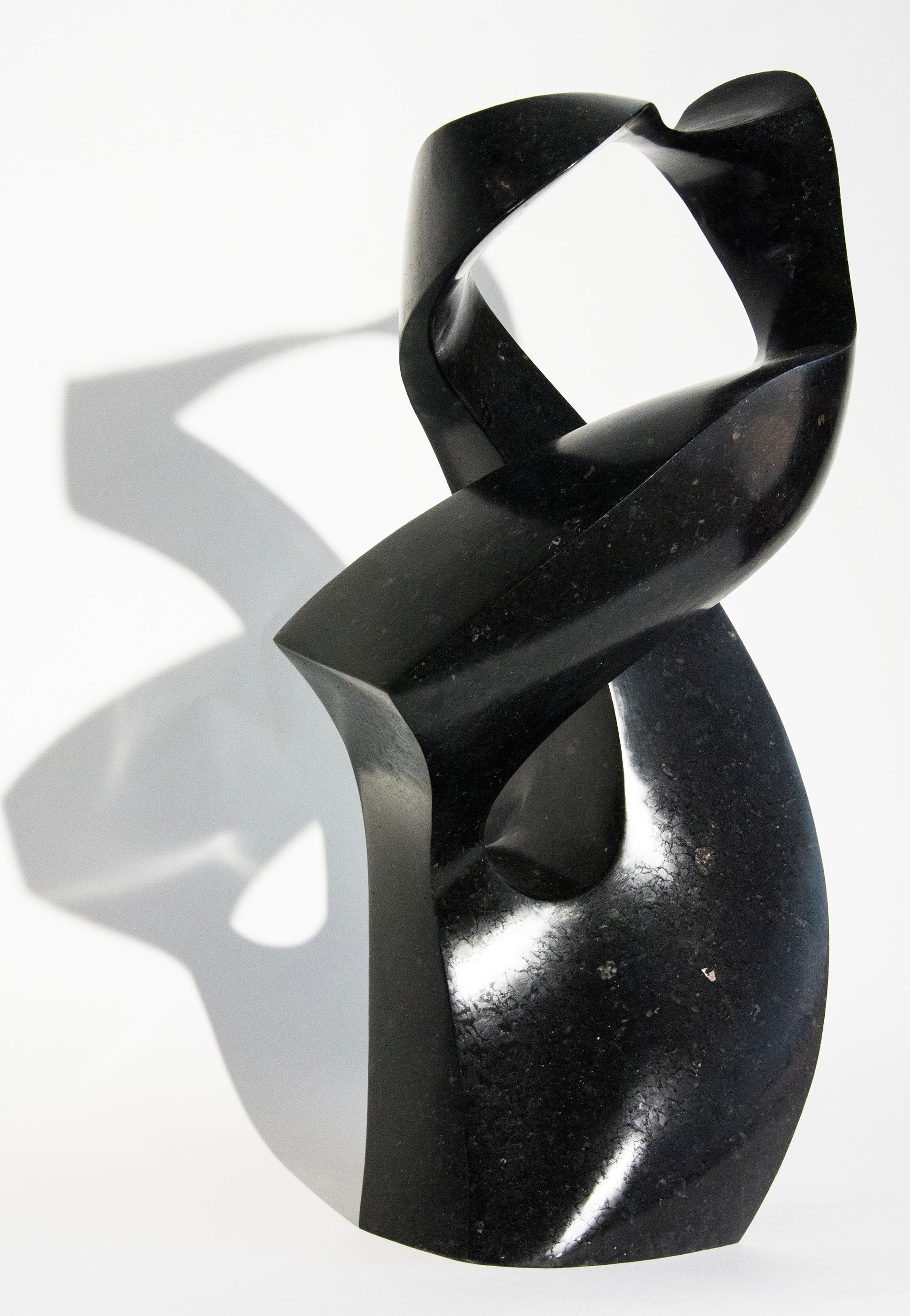 Embrace 4/50 - dark, smooth, polished, abstract, black granite sculpture For Sale 1