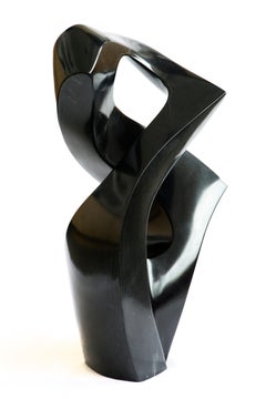 Embrace - small, smooth, polished, abstract, black marble sculpture