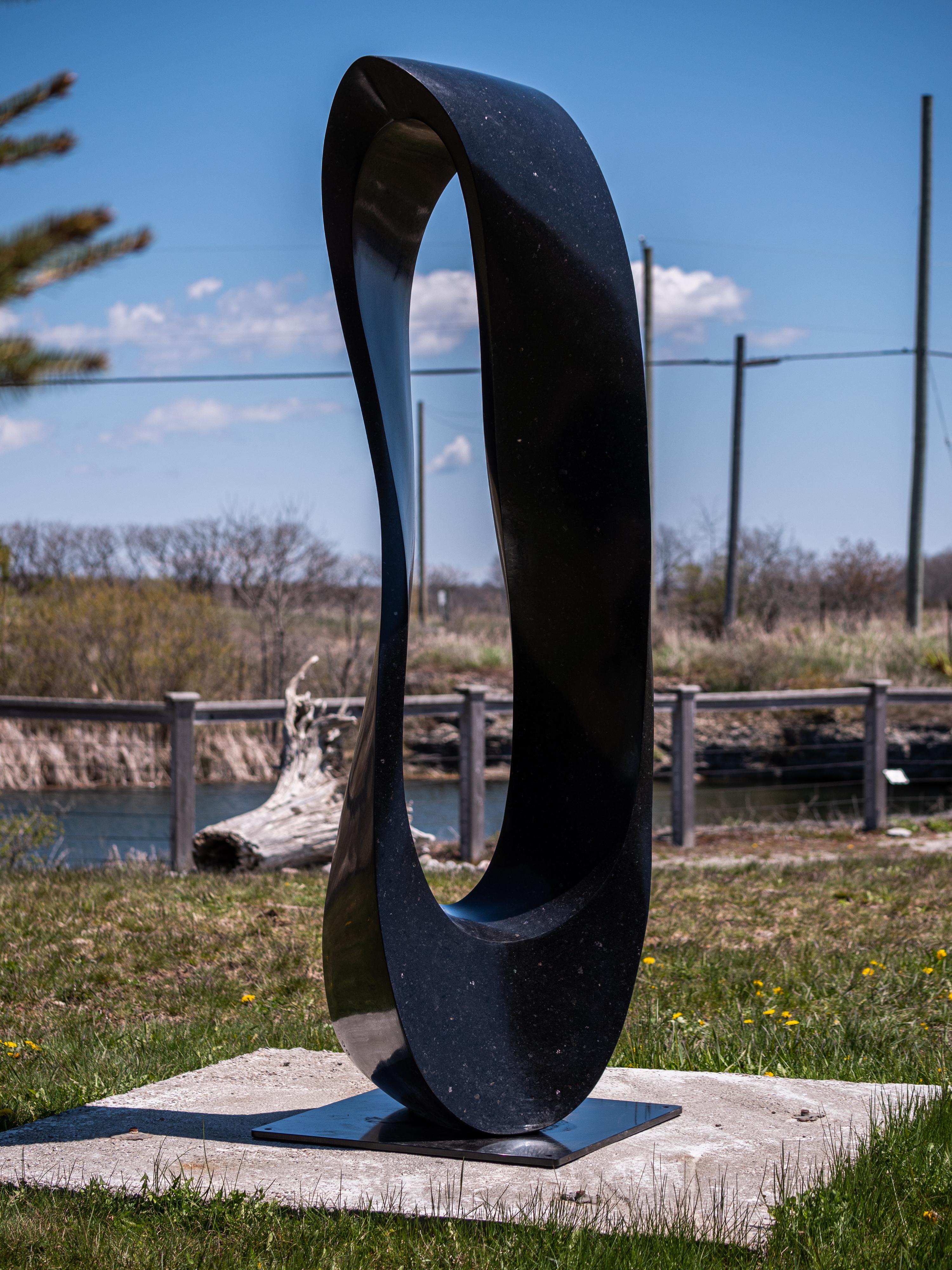 Mobius H6 12/50 - large, smooth, black granite, outdoor, abstract, sculpture 1