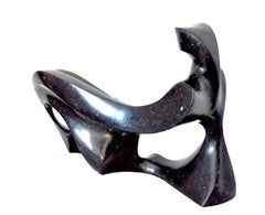 Repose 5/50 - scultura figurativa da tavolo, liscia, in granito nero