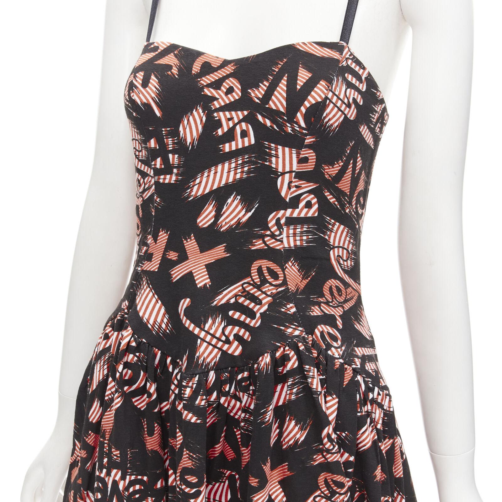 JEREMY SCOTT orange X-ray New York City Names strappy mini dress
Reference: ANWU/A01035
Brand: Jeremy Scott
Designer: Jeremy Scott
Material: Feels like cotton
Color: Orange, Multicolour
Pattern: Abstract
Closure: Elasticated

CONDITION:
Condition: