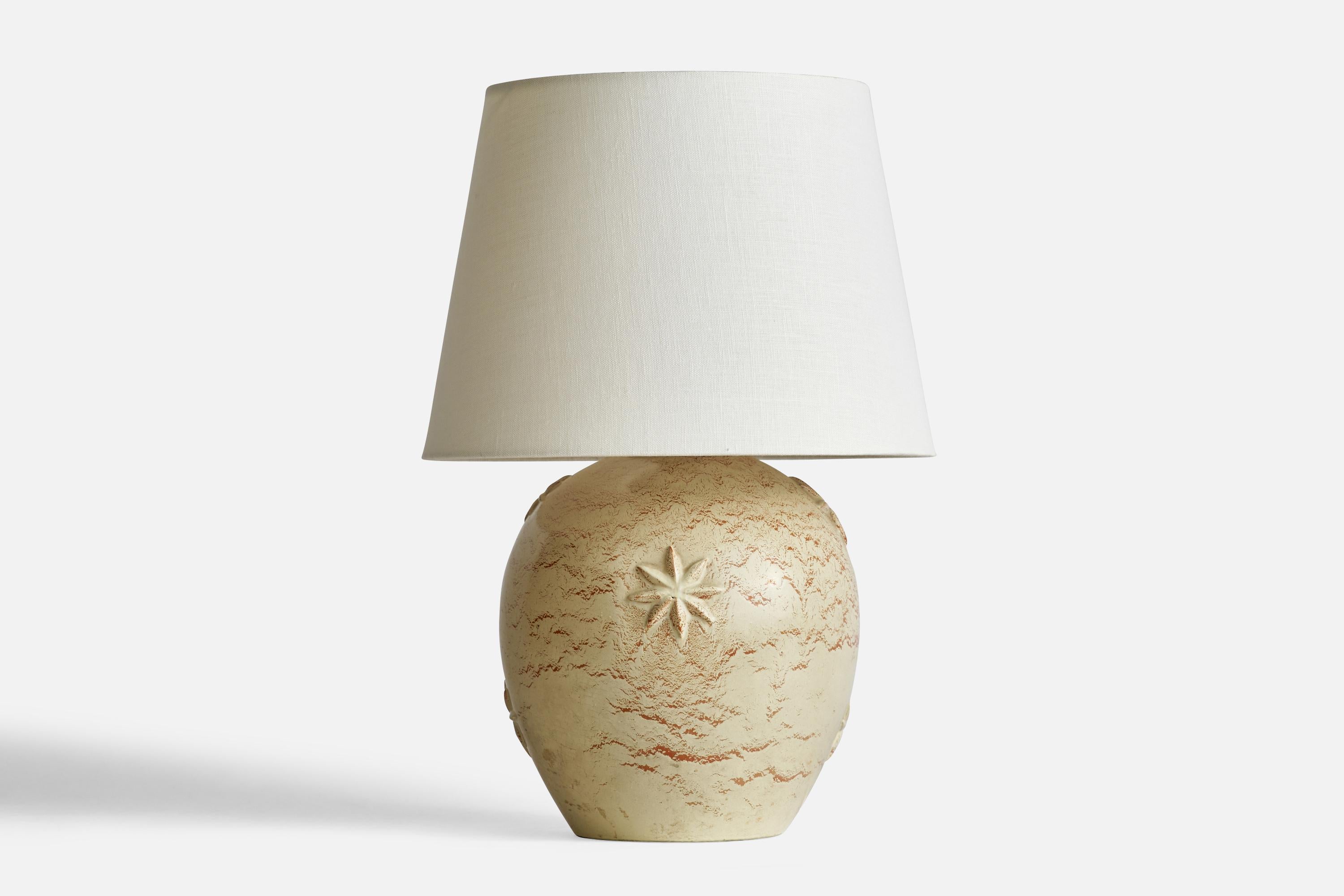 A light-beige ceramic and brass table lamp designed by Jerk Werkmäster and produced by Nittsjö, Sweden, c. 1930s.

Dimensions of Lamp (inches): 11.9” H x 8.15” Diameter
Dimensions of Shade (inches): 9” Top Diameter x 12” Bottom Diameter x 9”