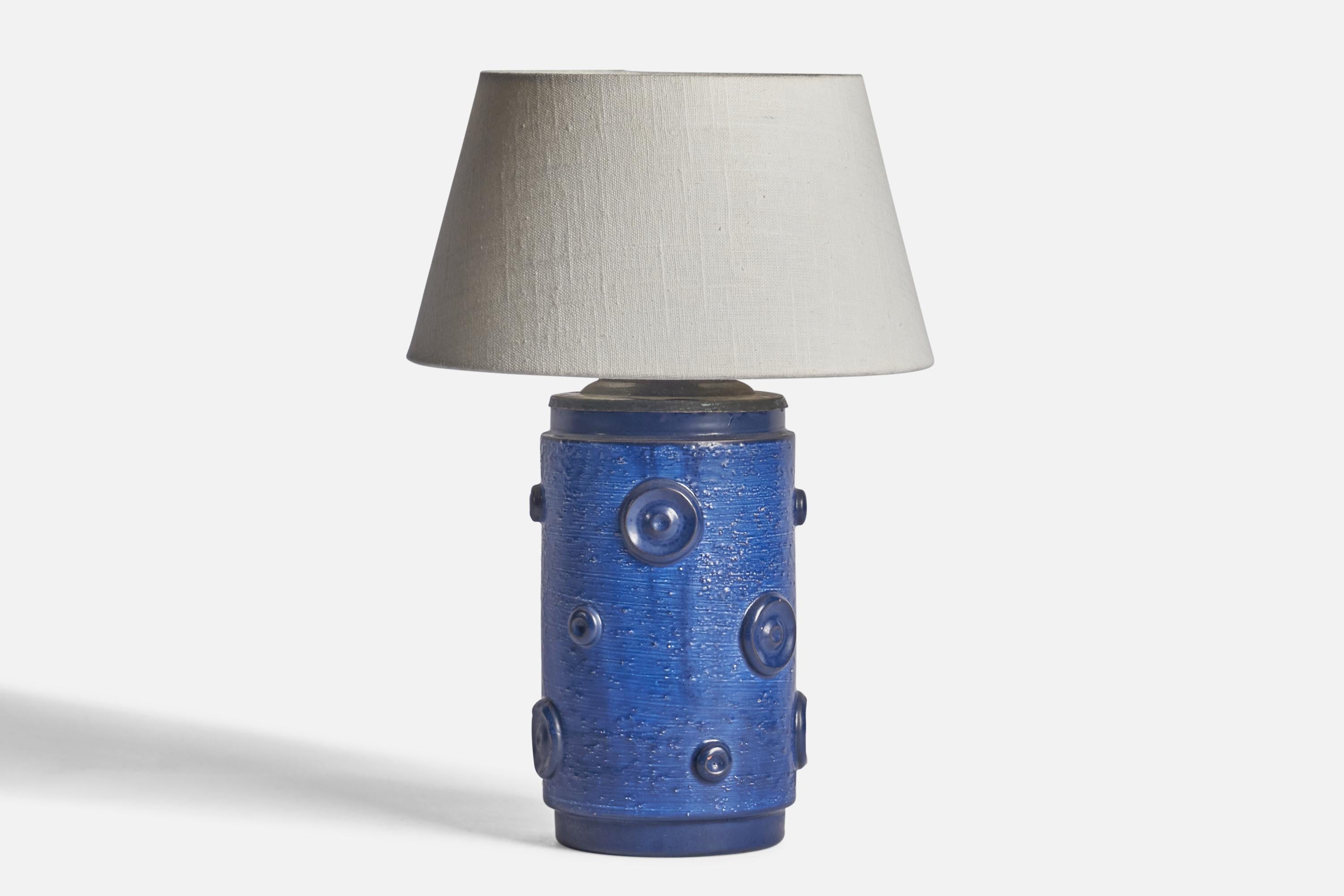 A blue-glazed stoneware table lamp designed by Jerk Werkmäster and produced by Nittsjö, Sweden, 1930s.

Dimensions of Lamp (inches): 11.25