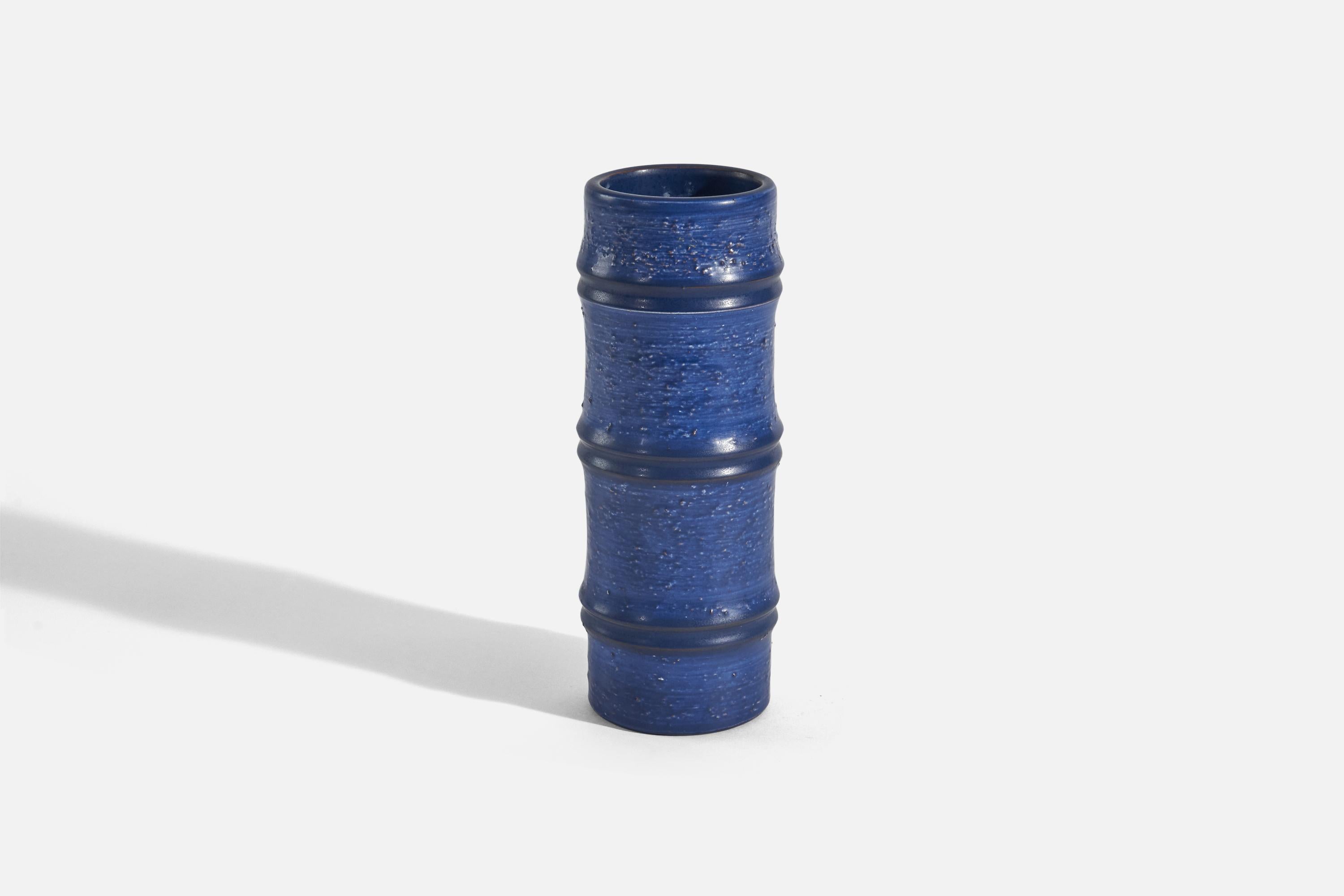 A blue-glazed earthenware vase designed by Jerk Werkmäster and produced by Nittsjö, Sweden, 1940s. 


