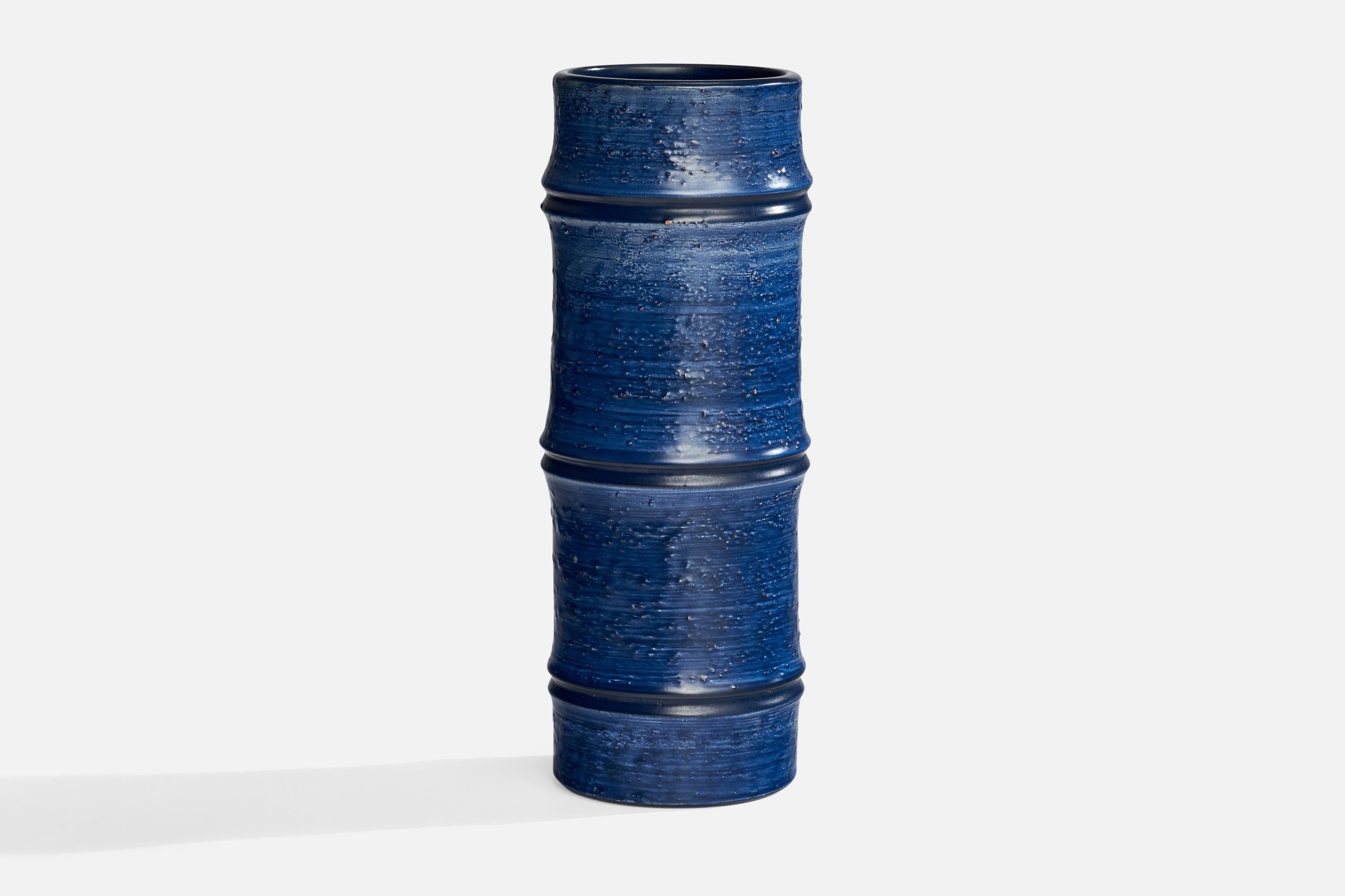 A blue-glazed ceramic vase designed by Jerk Werkmäster and produced by Nittsjö, Sweden, c. 1930s.
