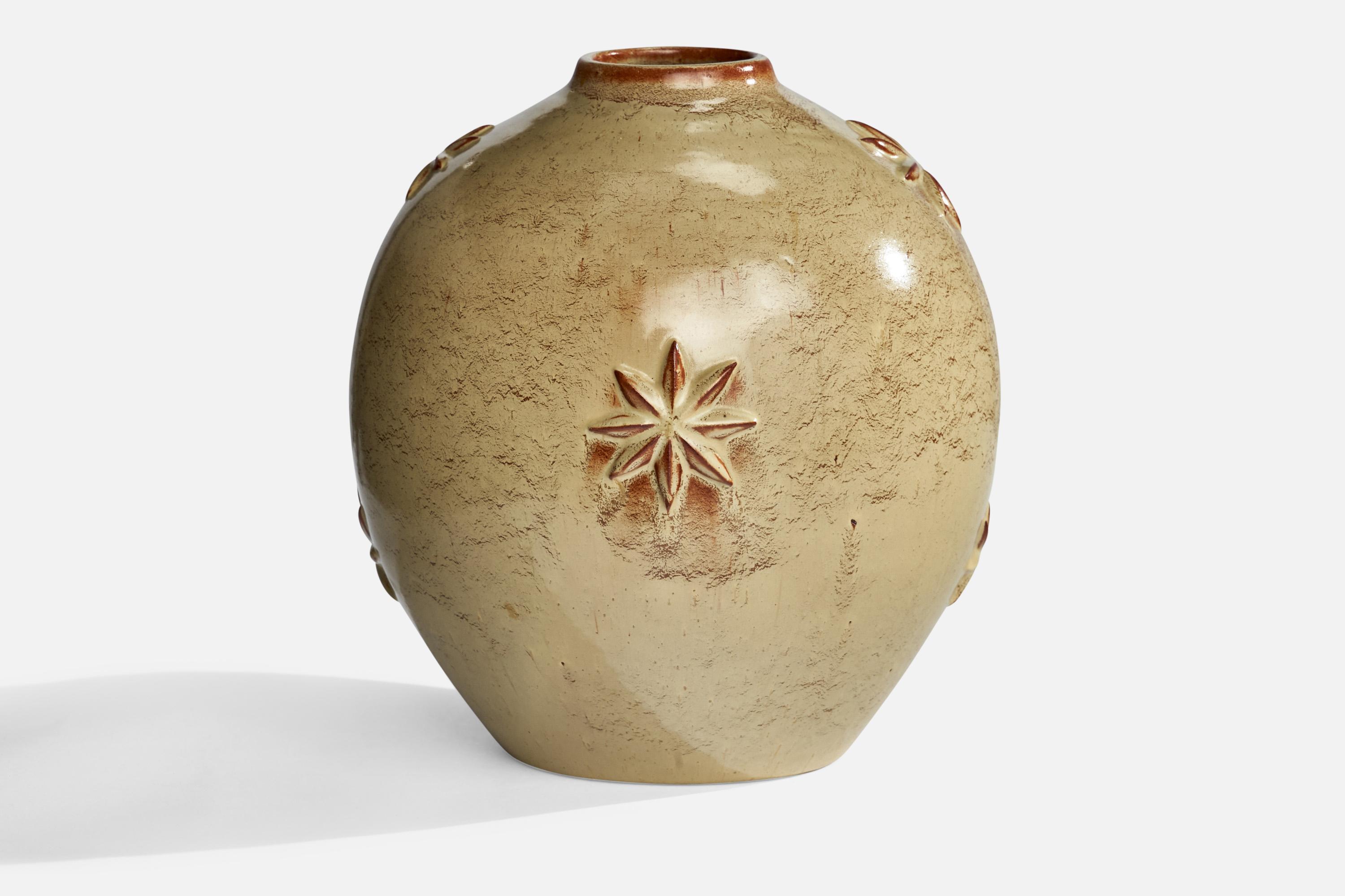 A beige-glazed ceramic vase designed by Jerk Werkmäster and produced by Nittsjö, Sweden, c. 1930s.