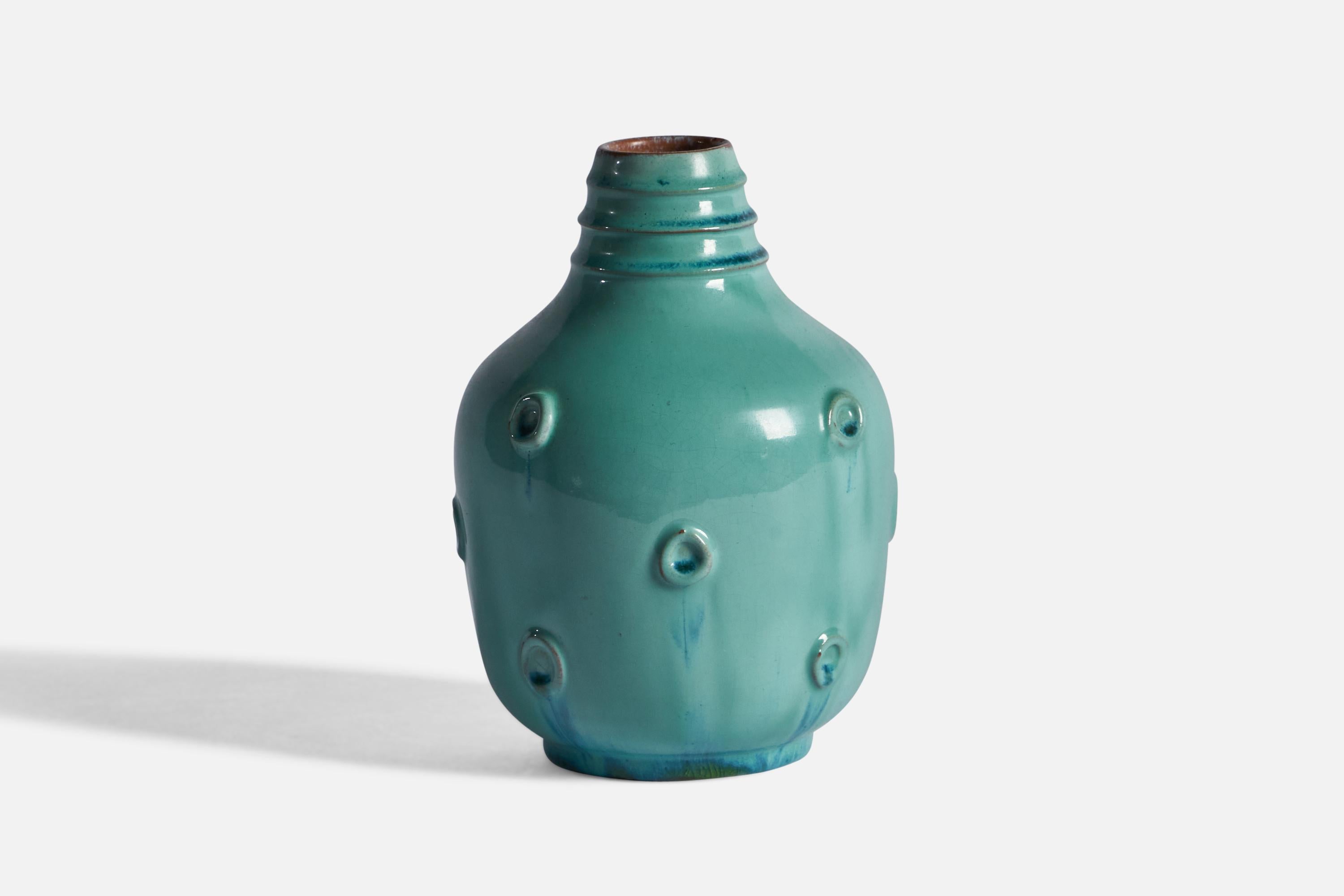 A green-glazed earthenware vase, designed by Jerk Werkmäster and produced by Nittsjö, Sweden, c. 1940s.