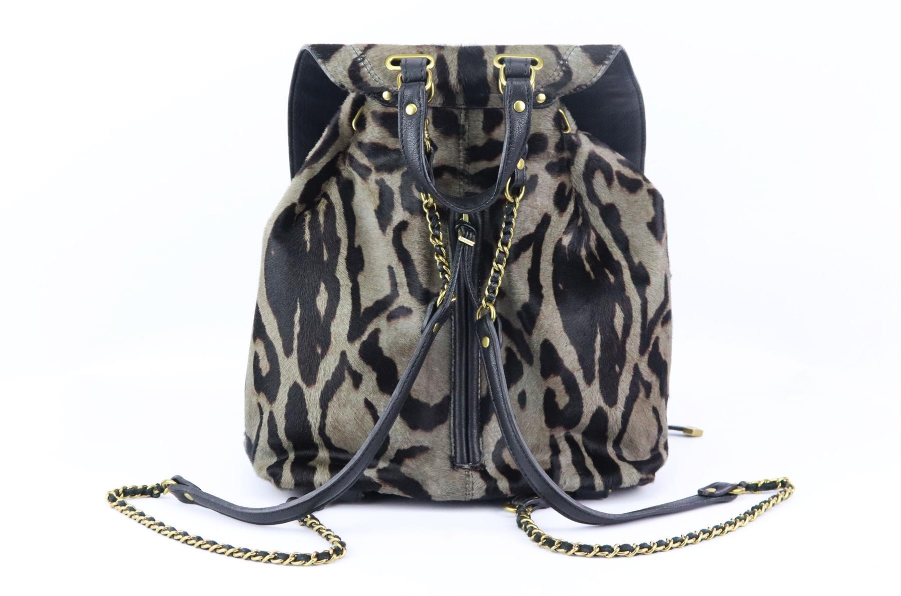This ‘Florent’ backpack by Jérôme Dreyfuss is perfect for those day-to-day looks, composed with supple dark-grey and black leopard-print calf hair and leather, it is accented with antiqued gold-tone hardware with a drawstring fastening and large