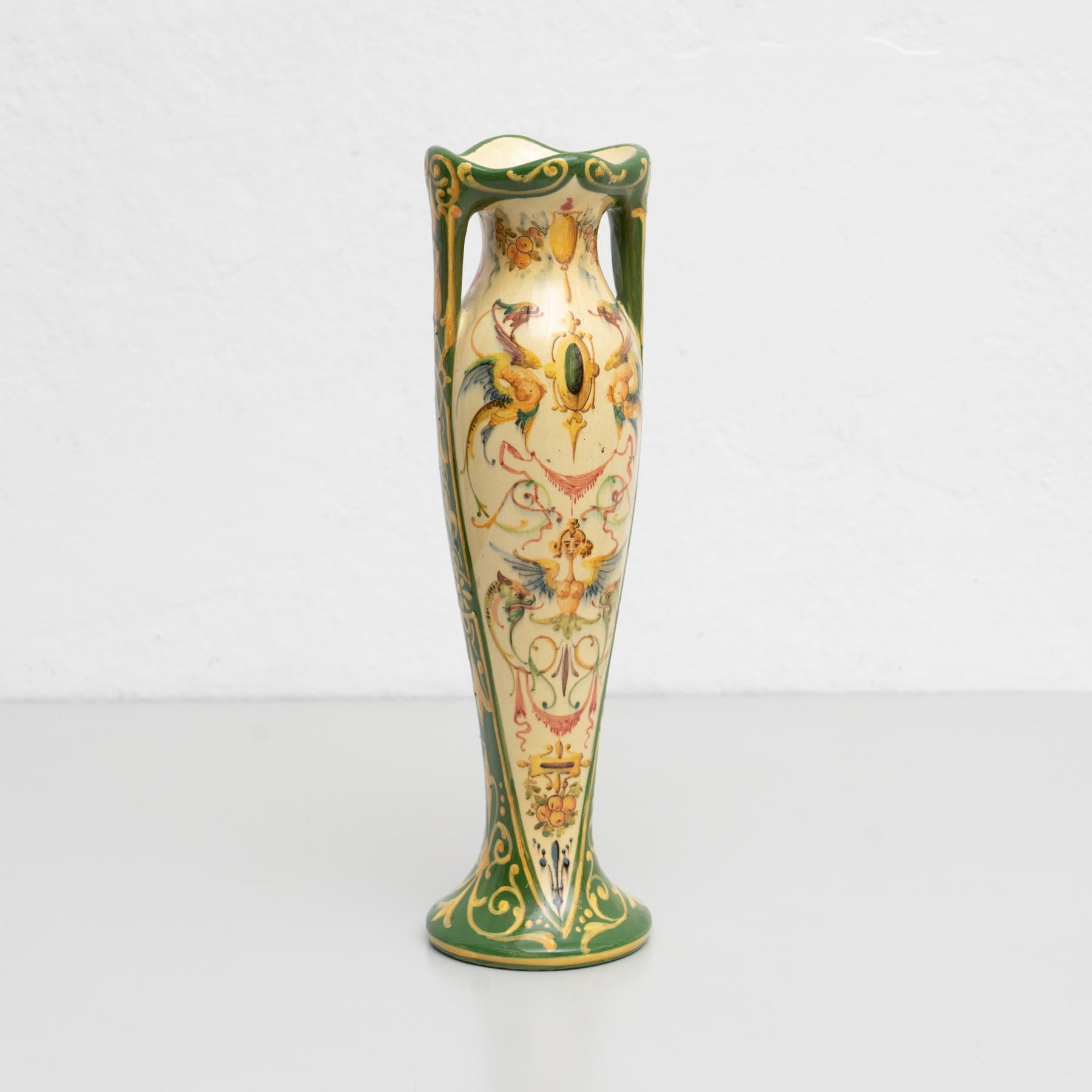 Jerome Massier Fils hand painted ceramic vase, 
Manufactured in Vallaruis, France.
Early 20th century.

In original condition, with minor wear consistent of age and use, preserving a beautiul patina.

Material:
Ceramic.
   