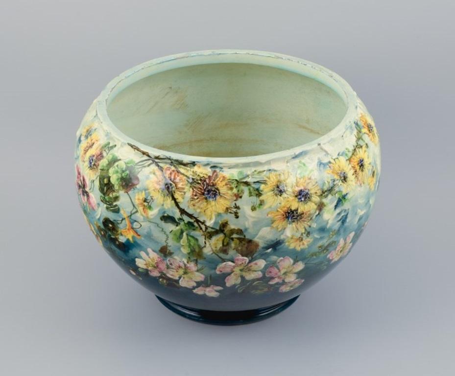 Jerome Massier for Vallauris, France.
Colossal ceramic jardinier hand painted with floral motifs.
Early 20th century.
Signed.
In excellent condition, lime residue inside.
Dimensions: D 40.0 x H 28.5 cm.