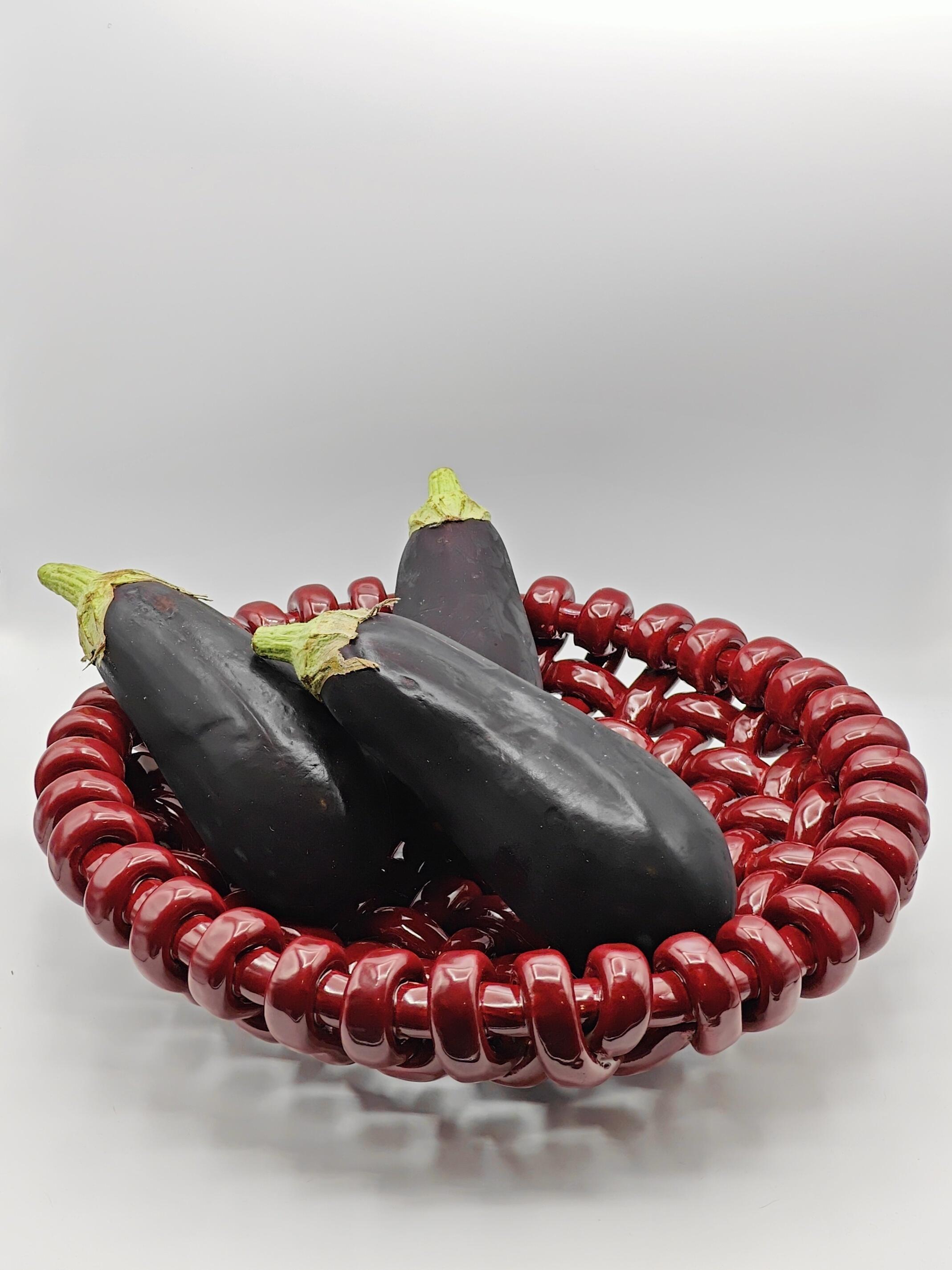 Magnificent centerpiece or fruit bowl by Jérôme Massier in enamelled ceramic from the 1950s in Vallauris, France. 

This sang-de-boeuf red is sparkling and gives a groovy touch to your decoration. 
This dish is from the 1950s and has some damage