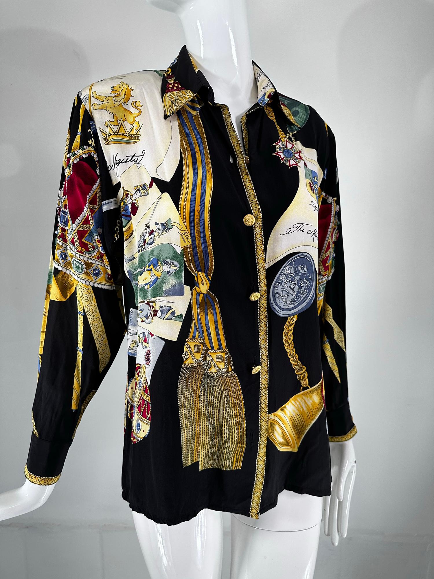 Jerri Sherman Collection 'Her Royal Majesty', military silk print blouse from the 1990s. Notched lapel washed silk blouse, closes at the front with gold metal plume buttons, with an extra button inside one the seam. Long full sleeves with double
