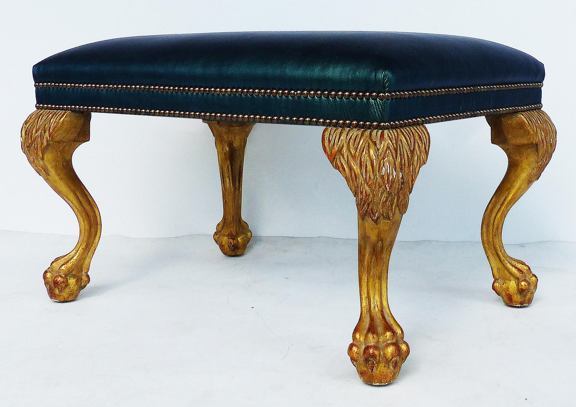 Jerry pair of Dennis & Leen lion paw benches/ottomans by Formations in leather

Offered for sale is a pair of elegant George I Jerry pair lion paw ottomans or benches by Formations for Dennis & Leen with leather upholstered seats with brass