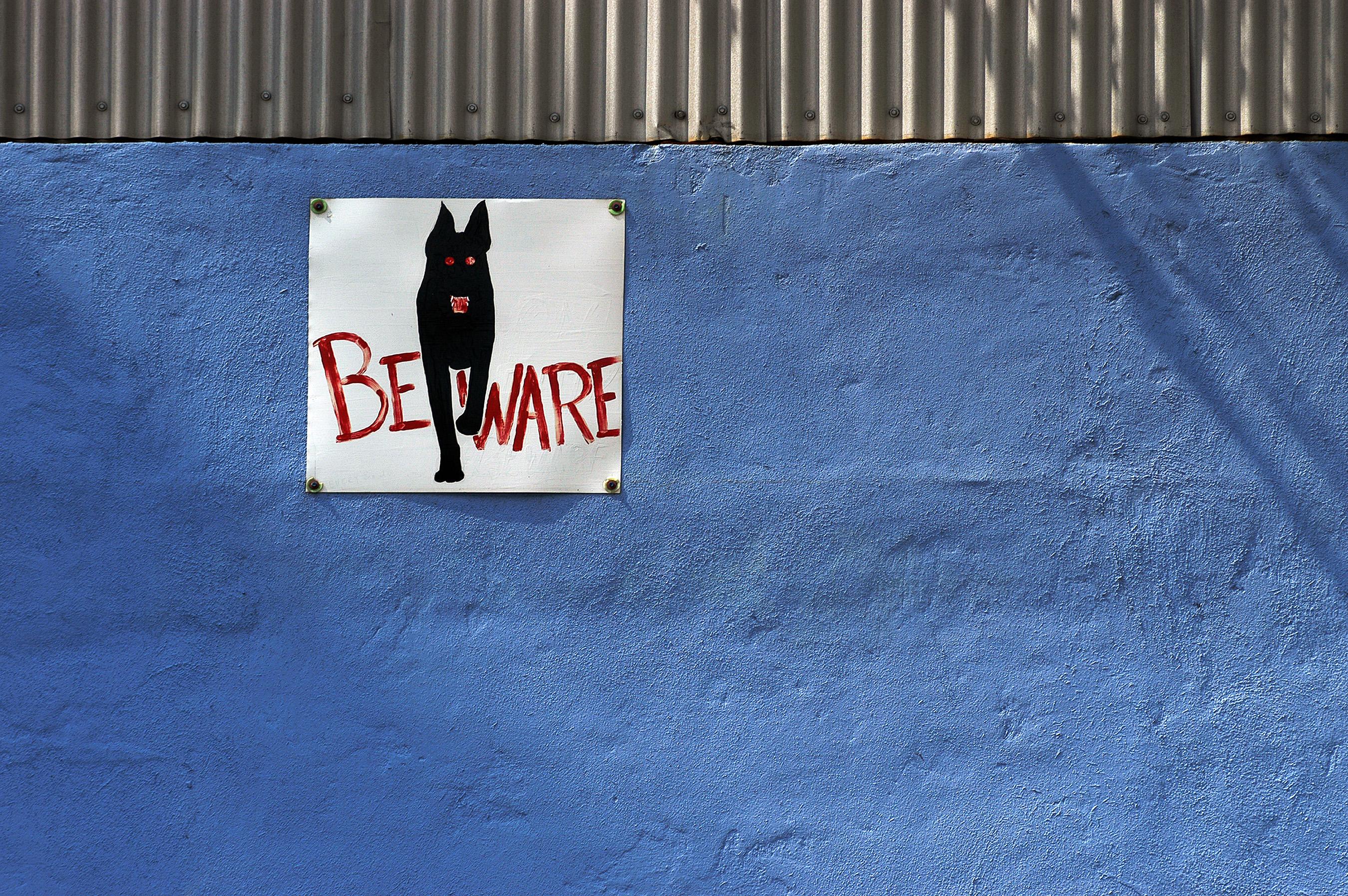 Jerry Siegel Color Photograph - "Blue (BEWARE)" - Southern Documentary Photography - Christenberry