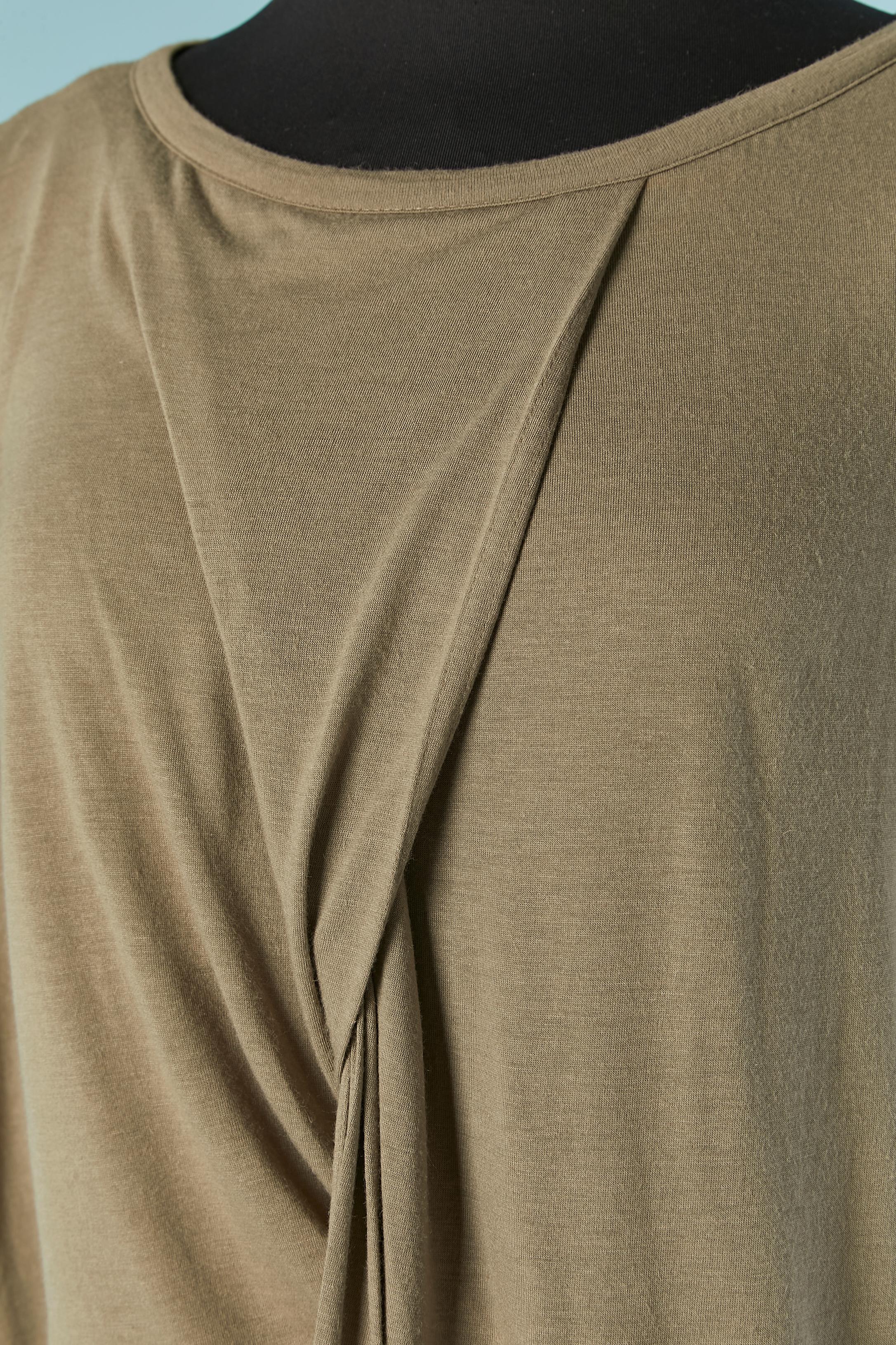 Jersey mini-dress with twisted tee-shirt . 
Fabric composition: 65% rayon, 20% nylon, 8% angora, 7% cashmere 
SIZE S/M 