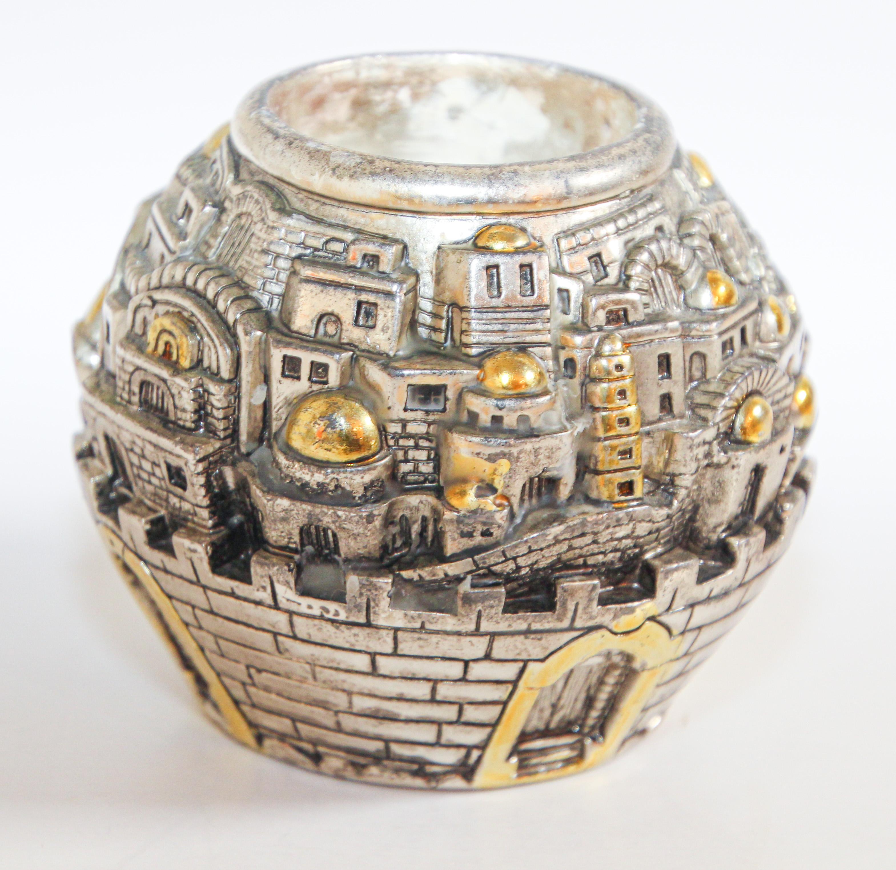 Jerusalem Holy land design round shape tea light holder.
Silver plated with gold tone candleholder representing Jerusalem’s view.
Vintage candleholder engraved 925, Jerusalem Holy land.