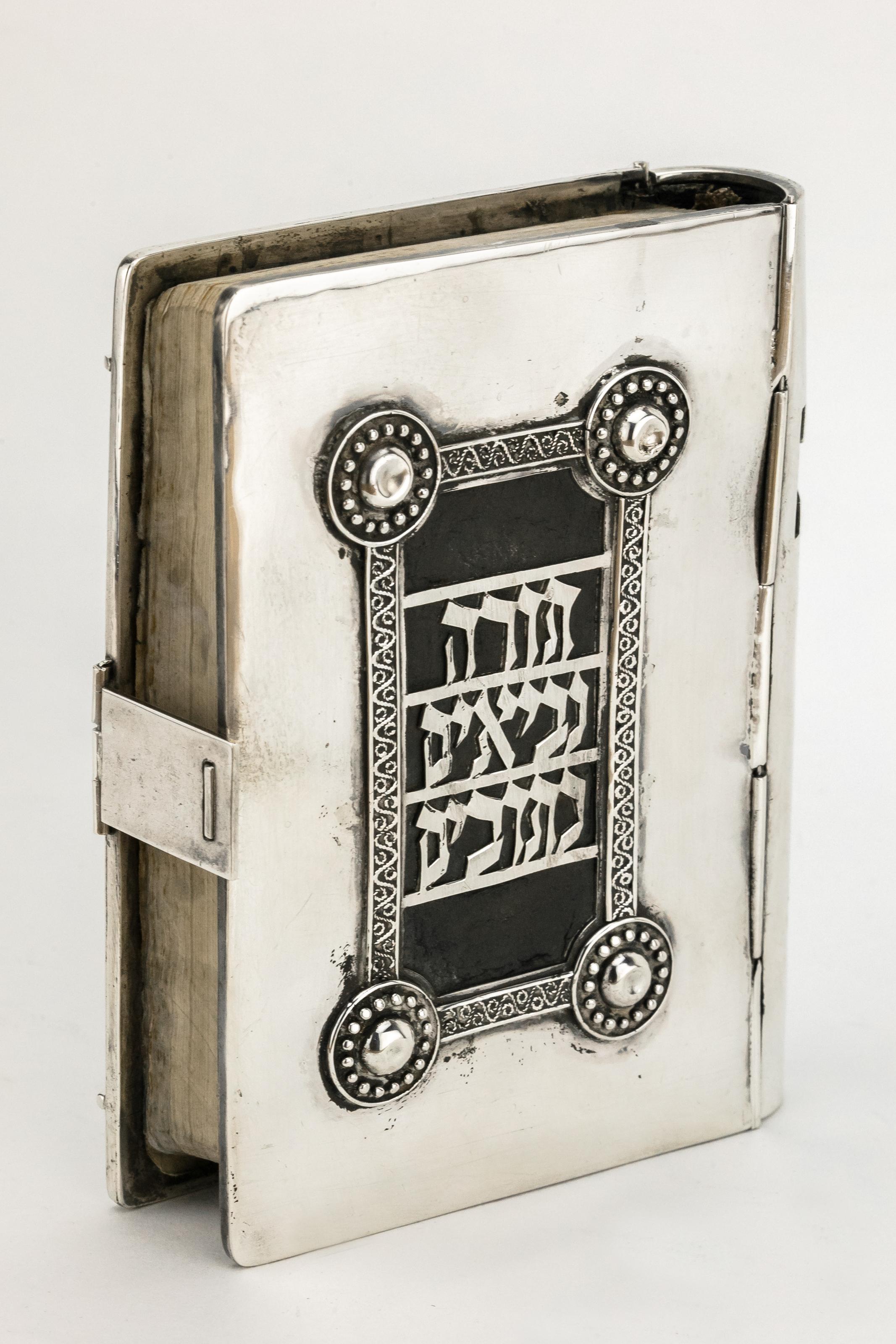 Tanach (Five Books Of Moses) with silver binding, handmade with dedication handwritten and signed by the President of Israel, Shimon Peres.
With the five Megillot, Sinai publishing, Tel Aviv. Given in a handmade, cut silver binding, delicately done