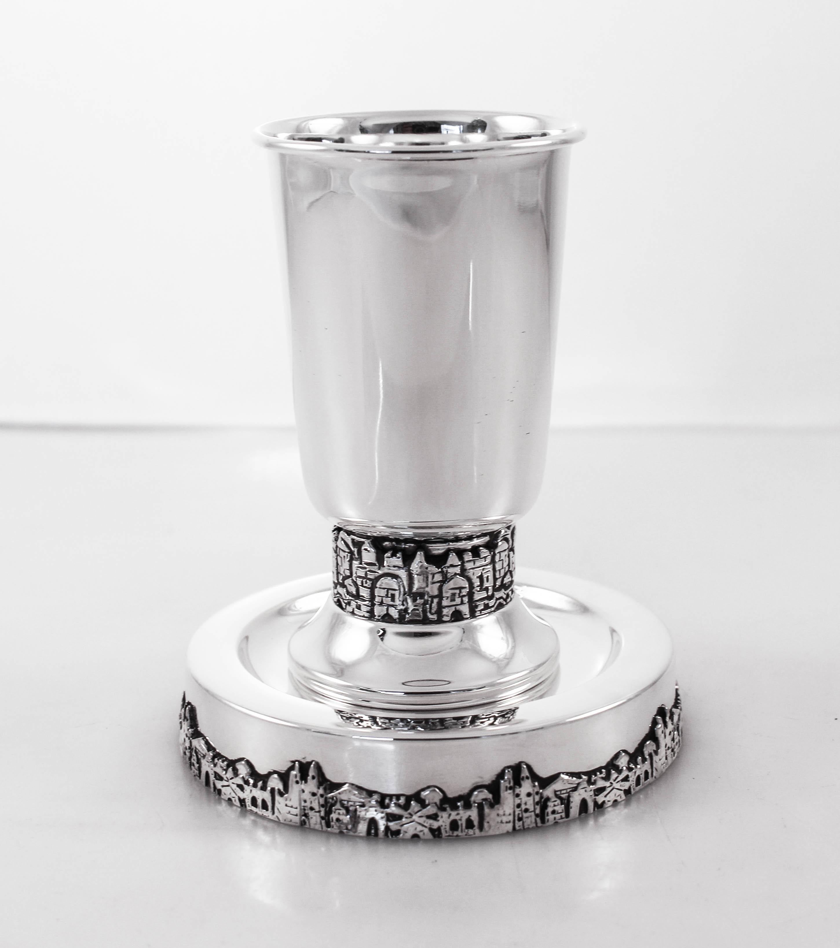 Proudly offering this sterling silver Kiddush cup and matching plate. The Jerusalem skyline decorates the base of the plate and the cup too. If you want one simple word to symbolize all of Jewish history, that word would be ‘Jerusalem’!
Is there a