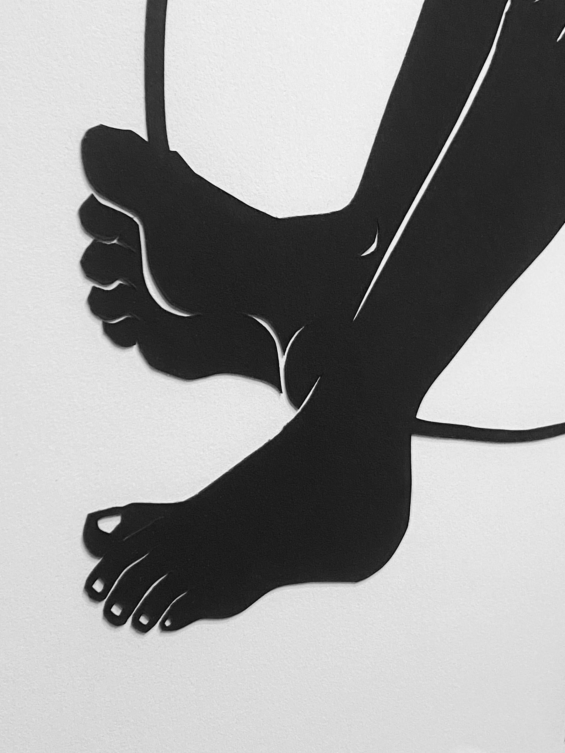 This piece is a black and white figurative work made of cut paper. 

Jerushia Graham is an Atlanta-based artist whose work straddles various media, including printmaking, book arts and fiber arts, but the most important aspect of her art is human