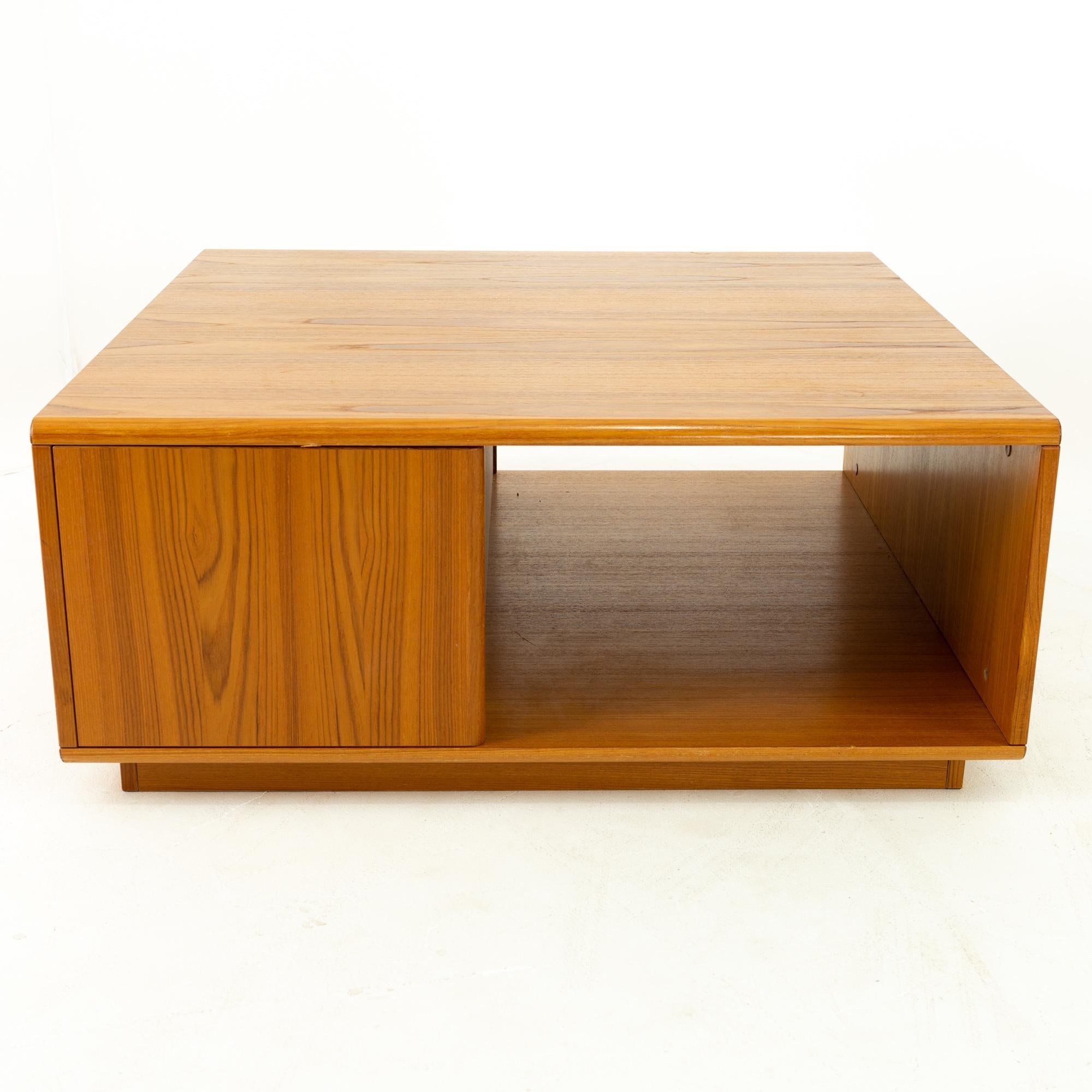 Jesper International midcentury Danish teak large storage coffee table 

Measures: 39 wide x 39 deep x 16.5 high

This price includes getting this piece in what we call restored vintage condition. That means the piece is permanently fixed upon
