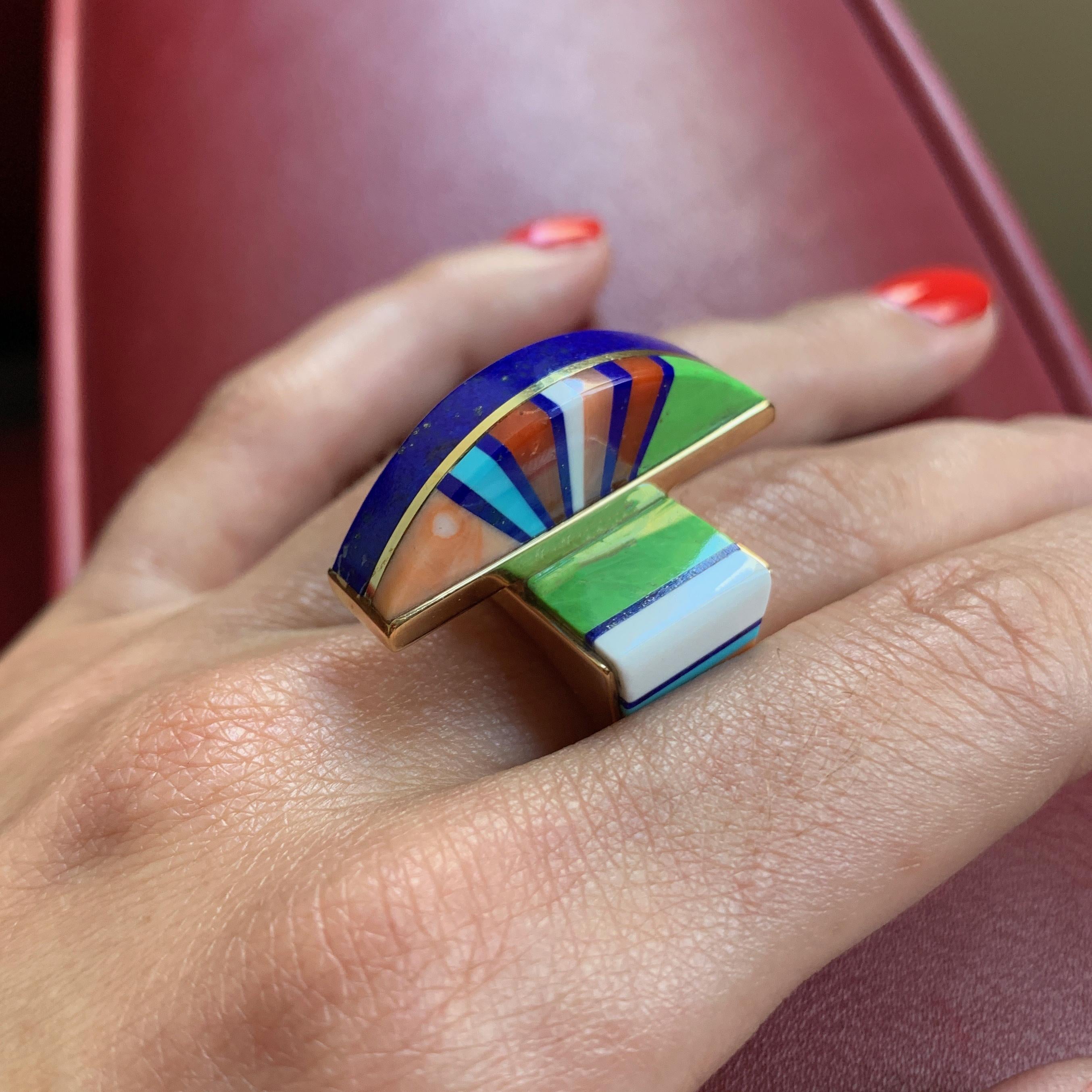 A gaspeite, lapis lazuli, opal, coral, turquoise, and 18-karat gold ring by superstar jeweler Jesse Monongya, made circa 2017. Monongya is an award-winning Navajo/Hopi jeweler known for his superb color combinations and contemporary interpretations