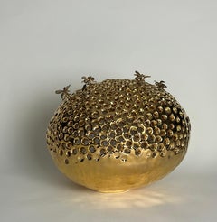 Ceramic and pure gold sculpture, bronze bees