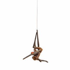 Fight I - Hanging Sculpture of Intertwined Bronze Figures with Orange Hood