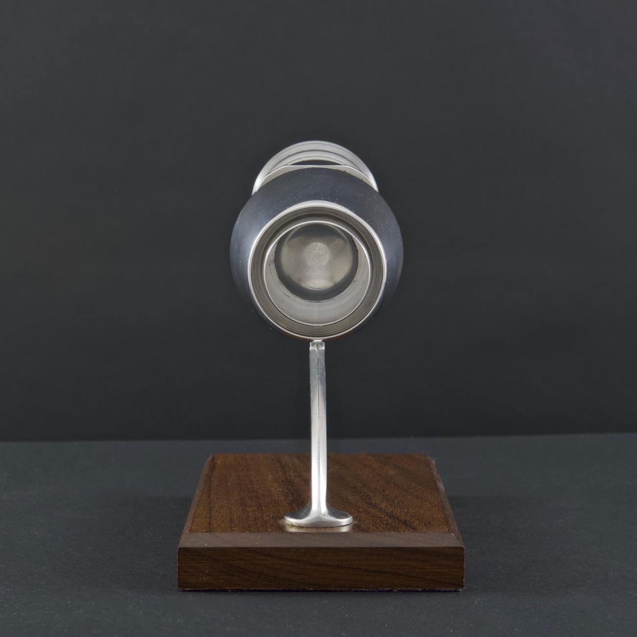 A wonderful presentation apprentice model of an aircraft jet engine (most likely an early version of the Bristol/Rolls Royce Olympus engine). This model is machined in polished aluminium and mounted on a hardwood plinth by a polished aluminium