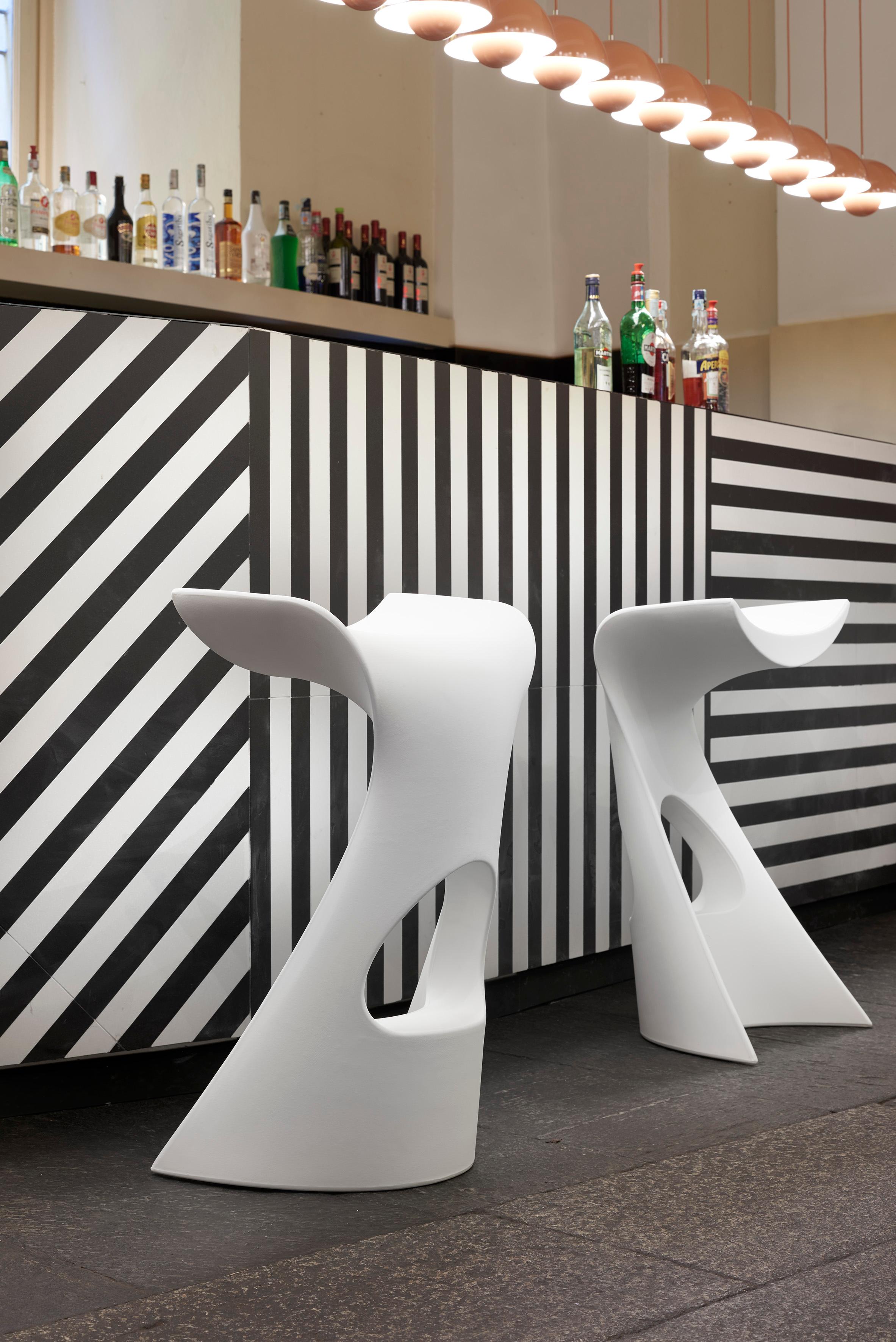 Jet Black Koncord High Stool by Karim Rashid
Dimensions: D 40 x W 43 x H 76 cm.
Materials: Polyethylene.
Weight: 5 kg.

Available in different color options. Available in standard, glossy or matte lacquered finishes. Also available in a