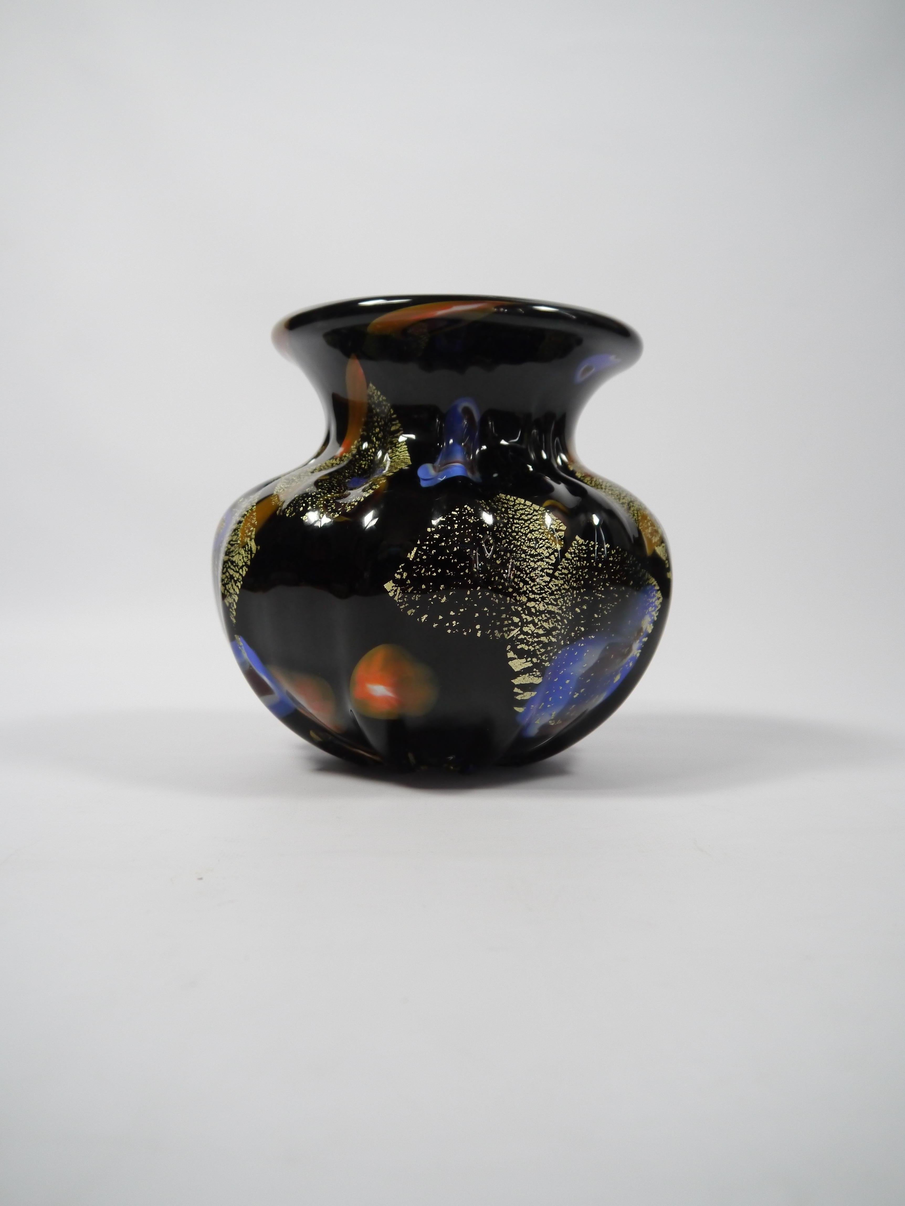 Rare glass vase hand blown by Japanese glass artist Toshichi (Tosti) Iwata (1893-1980), for Kamei Osaka in the 1950s. Jet black throughout and made in Sommerso, millefiori and avventurine technique giving the vase a depth and pattern that makes this
