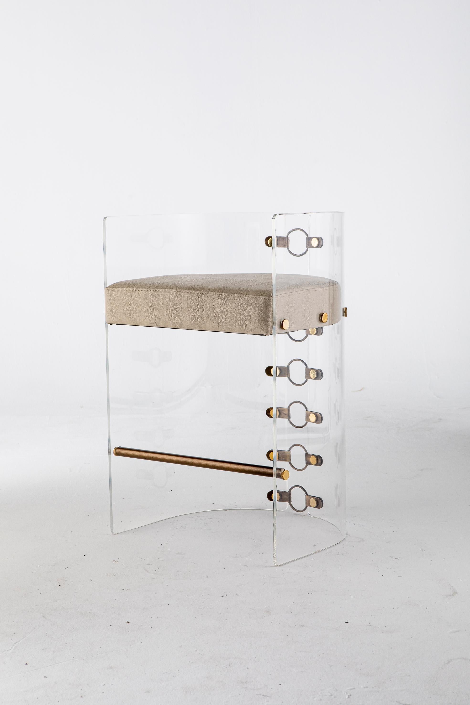Jetson Bar Stool by Egg Designs
Dimensions: 54 L X 49.5 D X 85 H cm 
Materials: Lucite, Bronzed Steel, Brass, Leather Upholstery

Founded by South Africans and life partners, Greg and Roche Dry - Egg is a unique perspective in contemporary