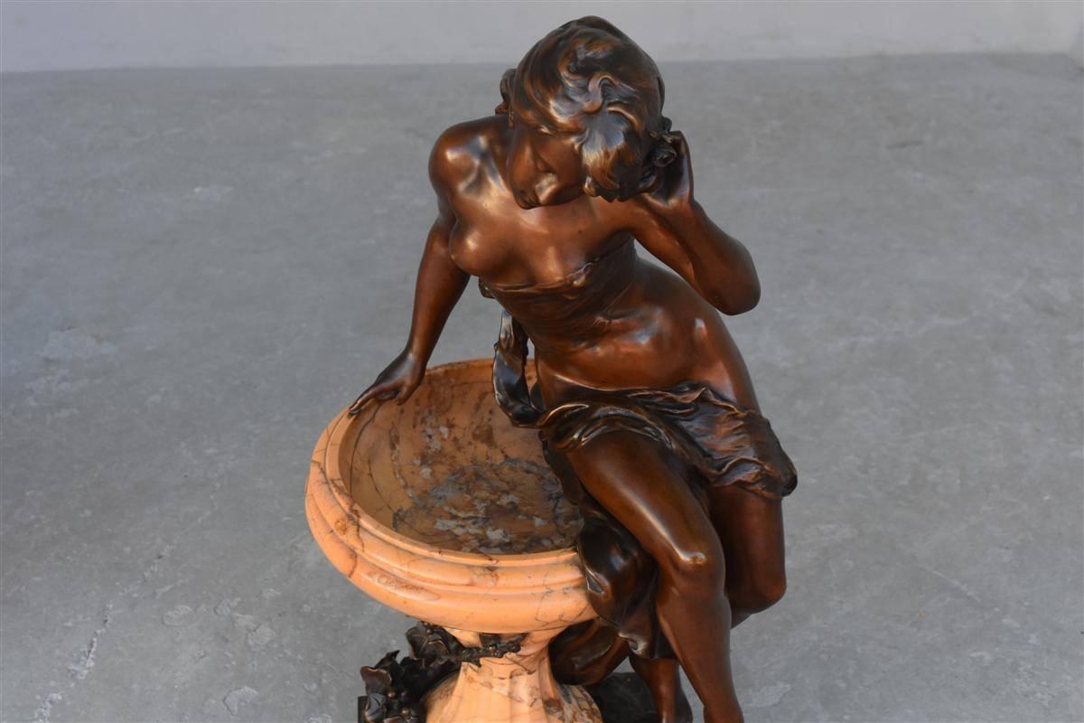 “Jeune fille à la fontaine” 
( Young girl on a fountain ), XIXth century rare bronze sculpture with brown patina and Sienne Marble by Mathurin Moreau 1822-1912.
Mounted on a marble column with gilt bronze features.
Measures: Total height 198