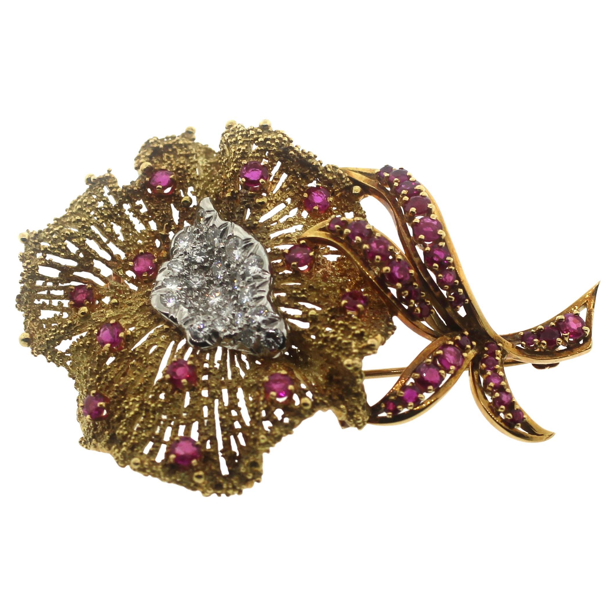 18K Yellow Gold and Diamond, Ruby Estate Flower Brooch
convertible to Pendent
1.5 Carts Diamonds
3 Carats Robby
31.4 Grams
2.2