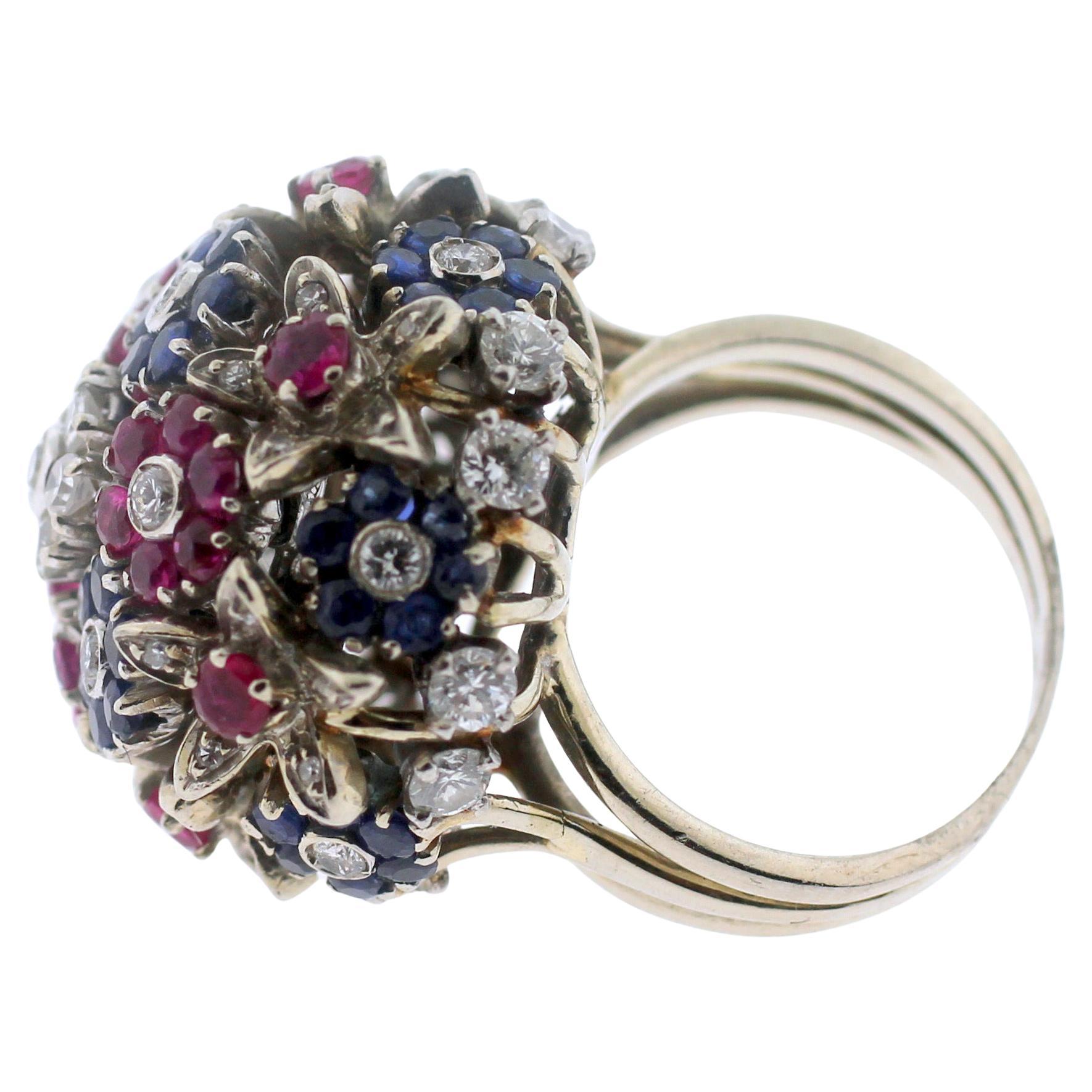 Jewel Of Ocean Estate Ring
White Gold  
Weight (g): 15.8 Grams
Diamonds, Ruby And Sapphire
Size: 23mm 
Shape: Round 
Maker: Estate Jewelry
Estimated Retail Price: $ 15,000
Excellent  Condition
All gemstone weights and measurements are approximate.