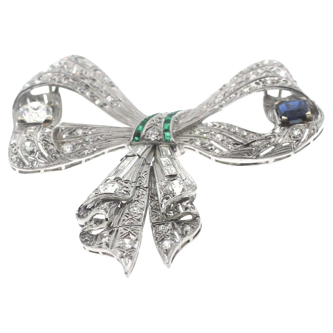 Art Deco Jewel Of Ocean Estate Platinum Diamonds, Sapphire and Emerald Bow Brooch Pendent