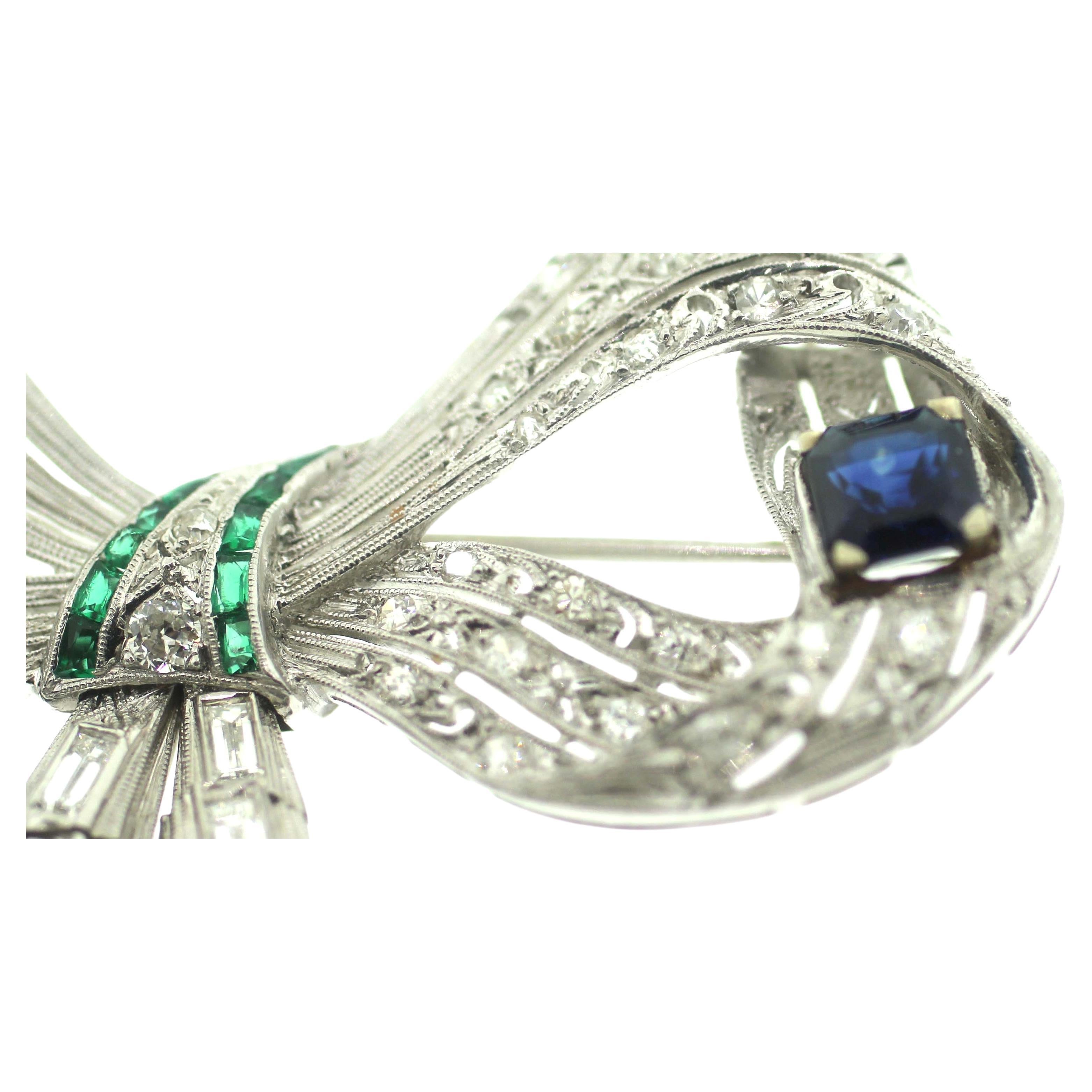 Jewel Of Ocean Estate Platinum Diamonds, Sapphire and Emerald Bow Brooch Pendent In Excellent Condition In New York, NY