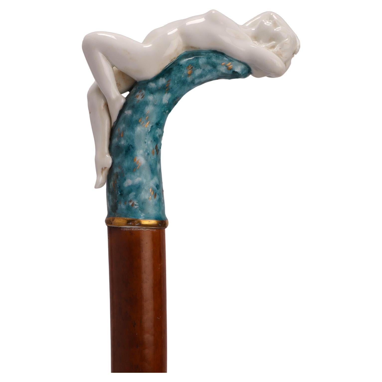 Jewel porcelain walking stick depicting a naked lying woman, Italy 1890.  For Sale