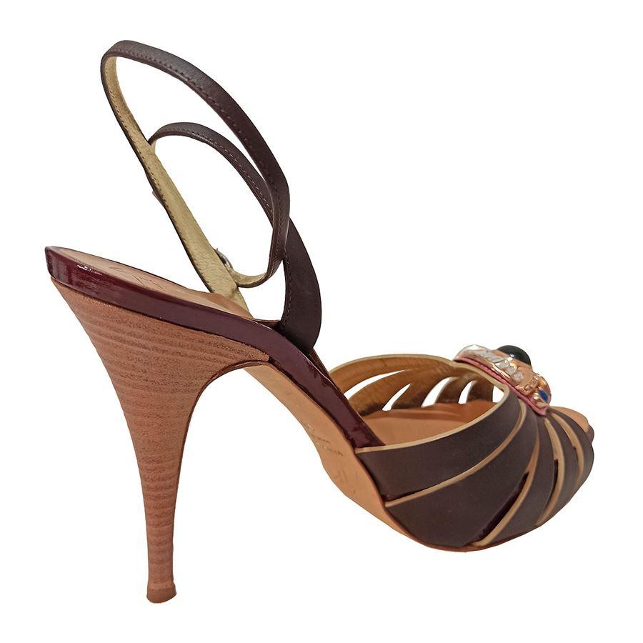 Leather Brown color Central jewel Ankle buckle Heel high cm 12 (472 inches) Plateau cm 25 (098 inches)
