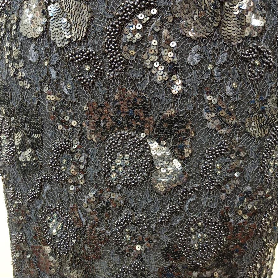 Nylon and cotton Laced Swarovski crystals and sequins Blue color Total length cm 44 (173 inches) Waist cm 34 (133 inches) French size 36 italian 40
