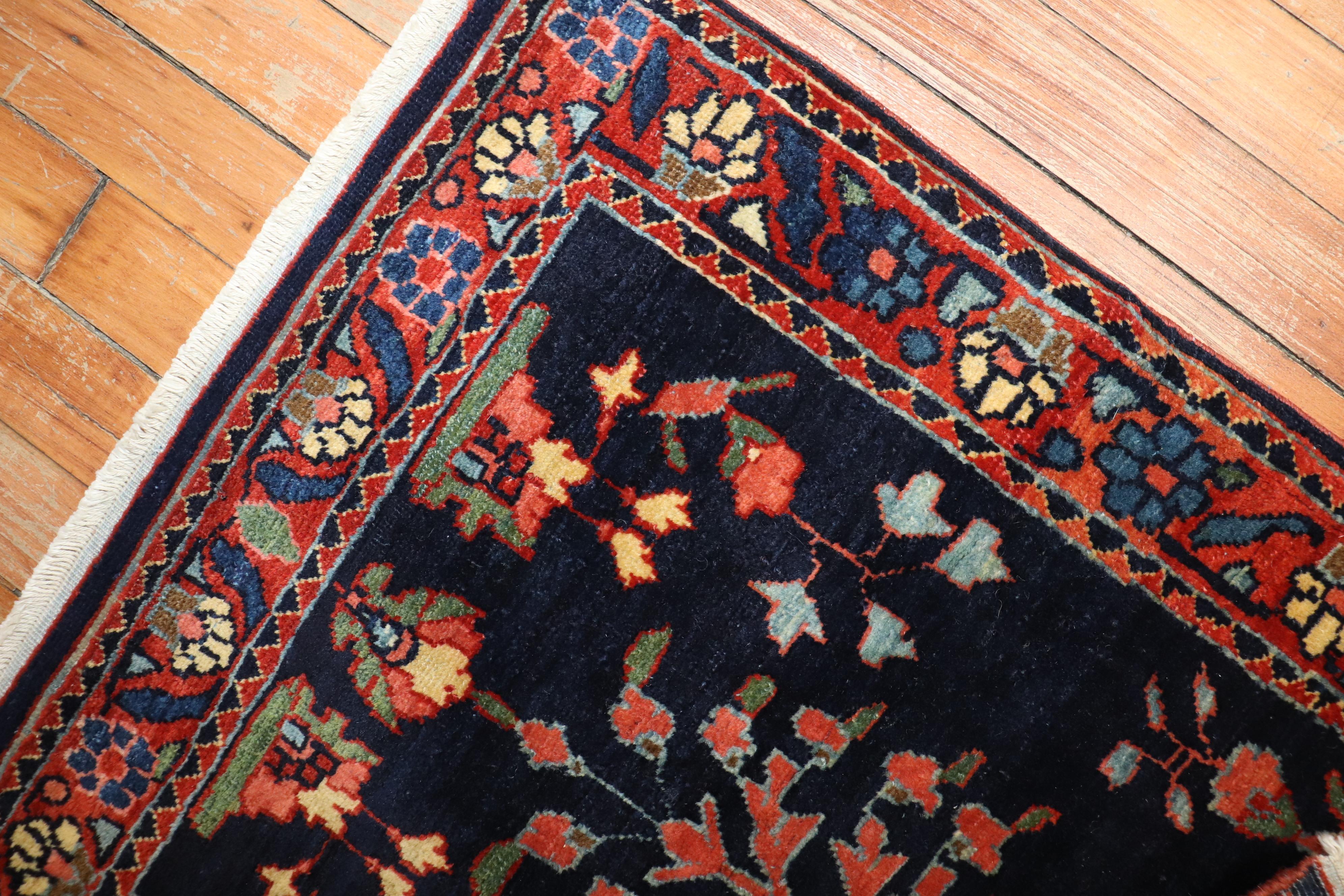 An authentic early 20th-century Sarouk carpet with traditional formal design 

Measures: 1'10