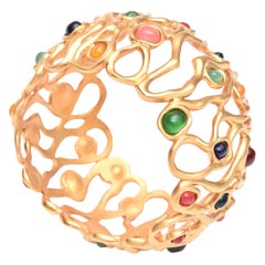 Bracelet manchette en pierres de couleur bijou avec plaque d'or