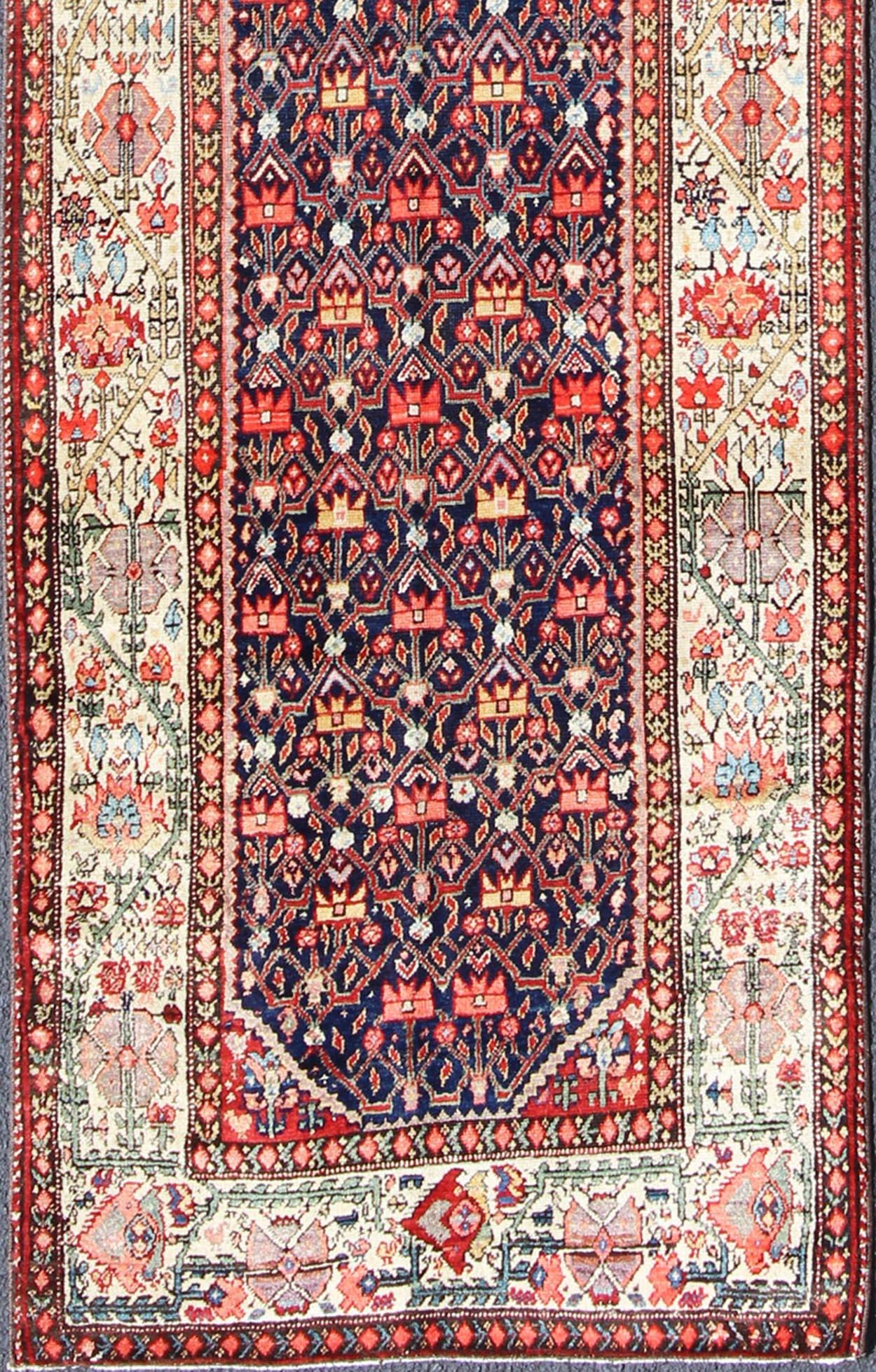 Red, blue, ivory, peach, mint and multicolored Persian antique Long Malayer Runner with geometric floral design, kwarugs/ ema-7521, country of origin / type: Iran / Malayer, circa 1920

This antique Persian Malayer runner, circa early 20th